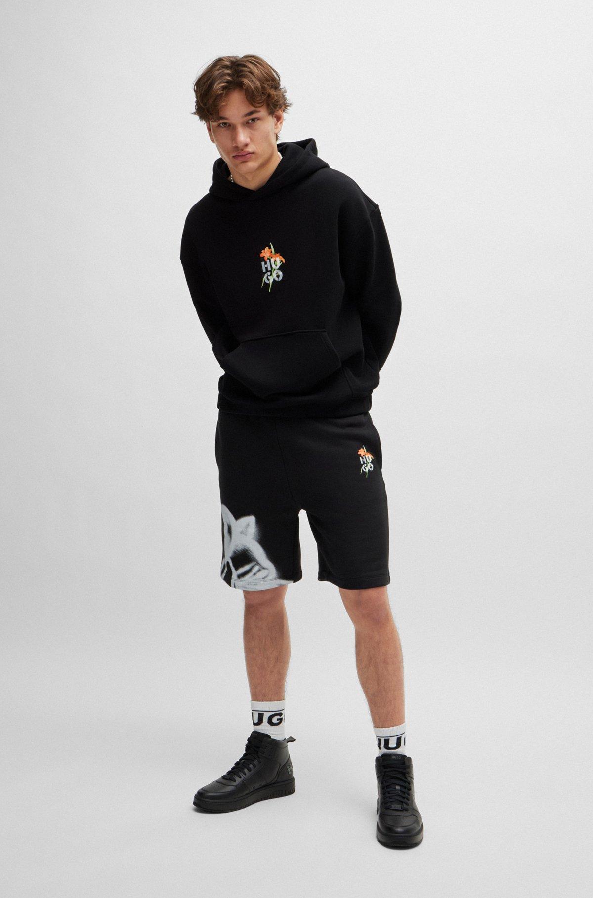 Oversize-fit hoodie with floral artwork Product Image
