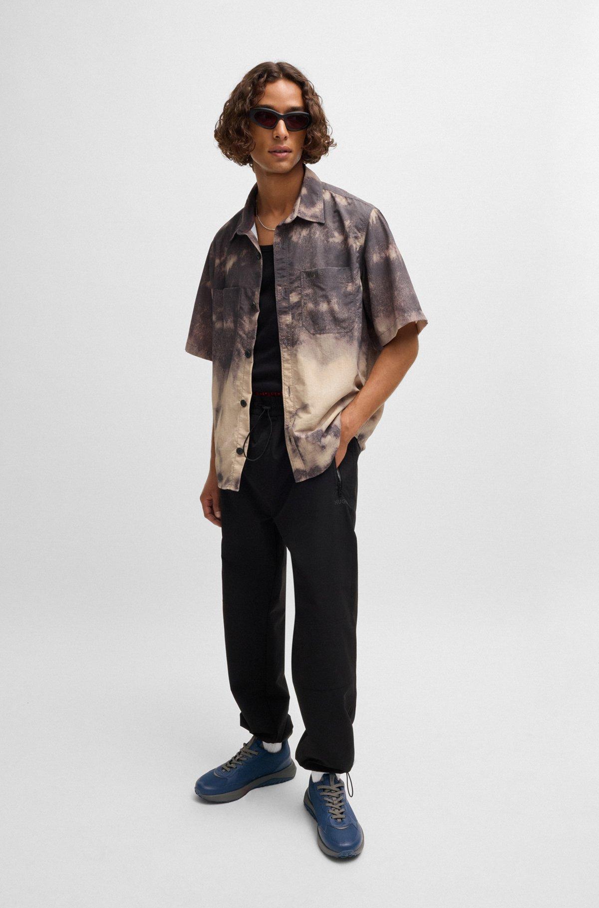 Mixed-material trainers with logo-tape trim Product Image