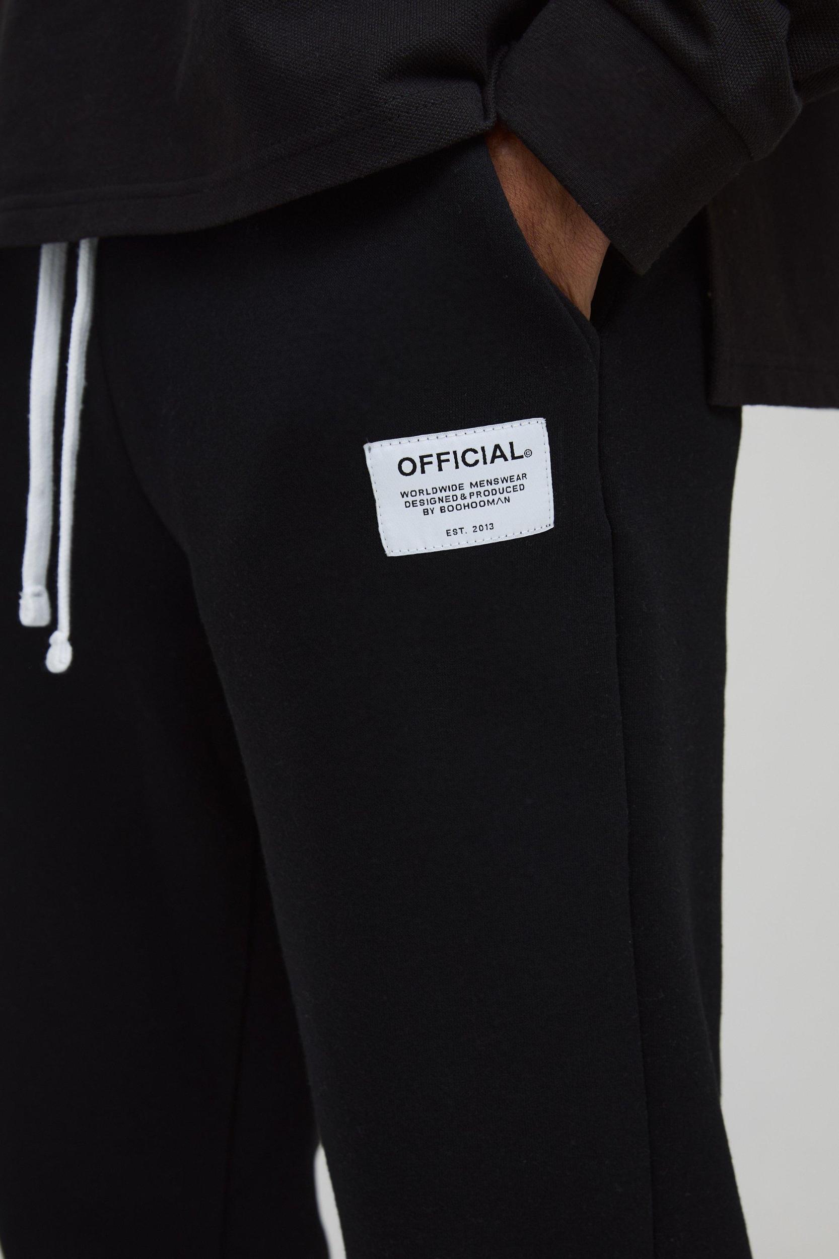 Slim Fit Flare Stacked Woven Tab Gusset Sweatpants | boohooMAN USA Product Image