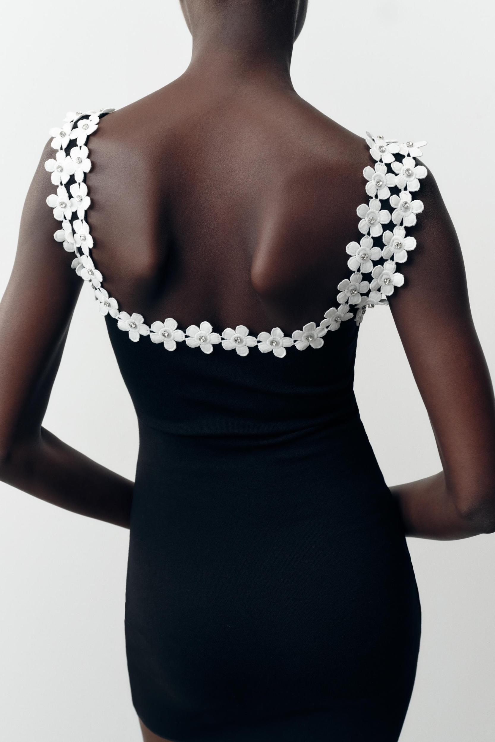 STRETCH DRESS WITH FLOWER HARDWARE Product Image