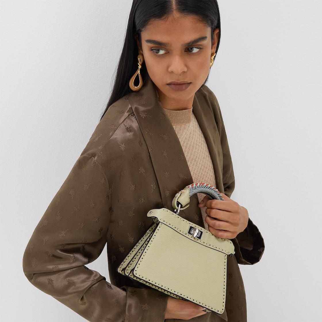 Peekaboo ISeeU PetiteSage green Selleria bag with 306 hand-sewn topstitches Product Image