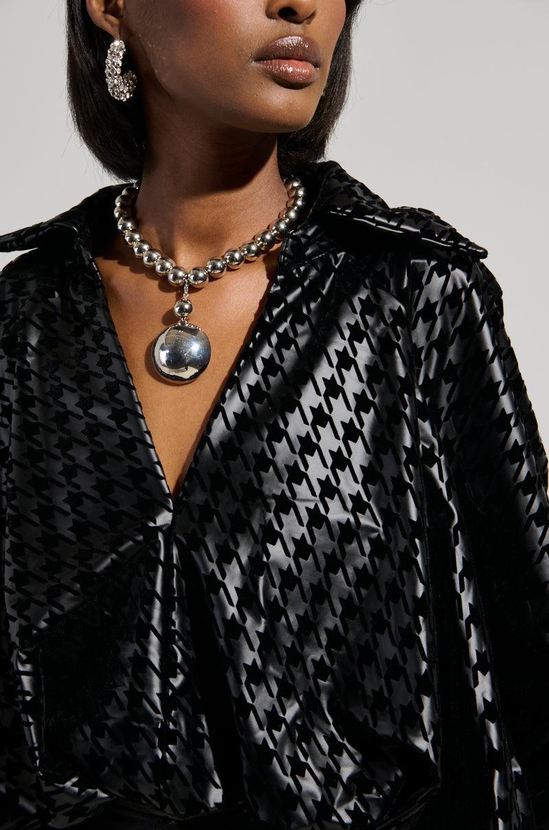 BADDEST OF EM ALL HOUNDSTOOTH FAUX LEATHER BLOUSE Product Image