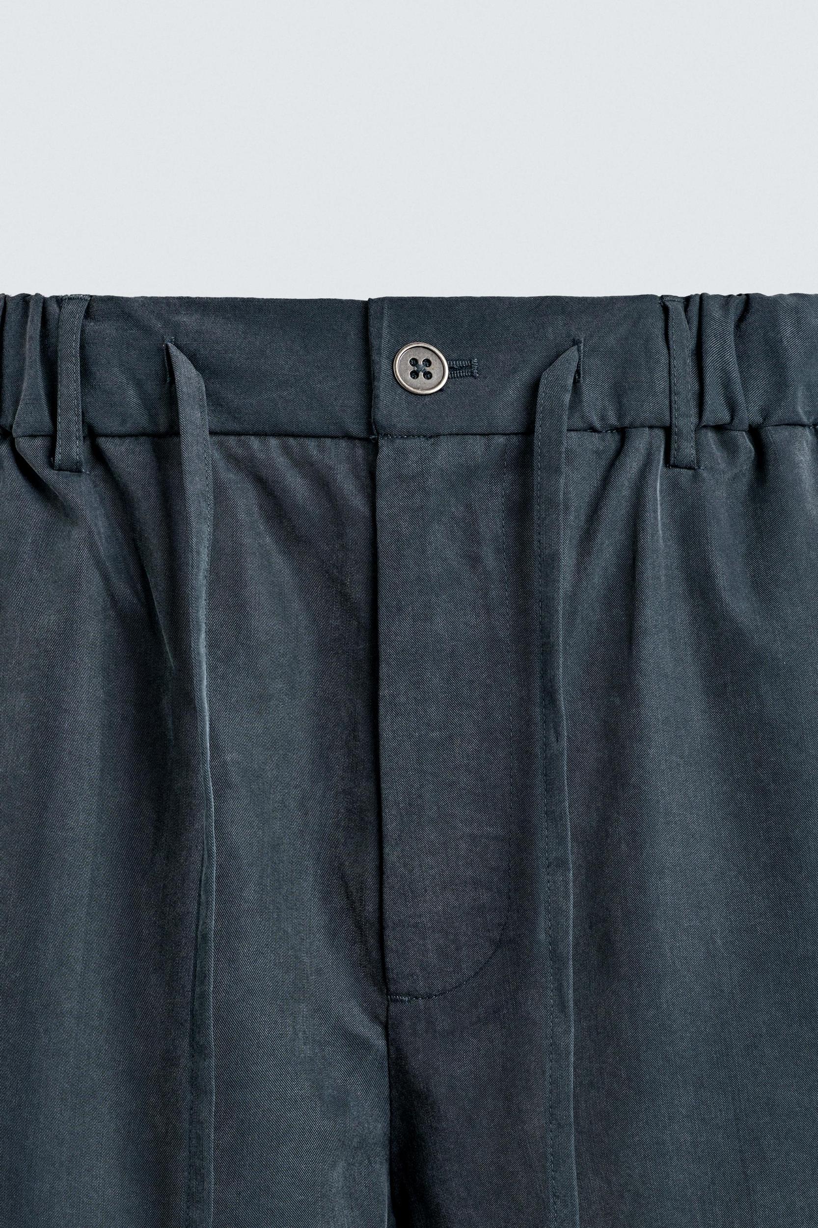 WASHED EFFECT RELAXED FIT SHORTS Product Image