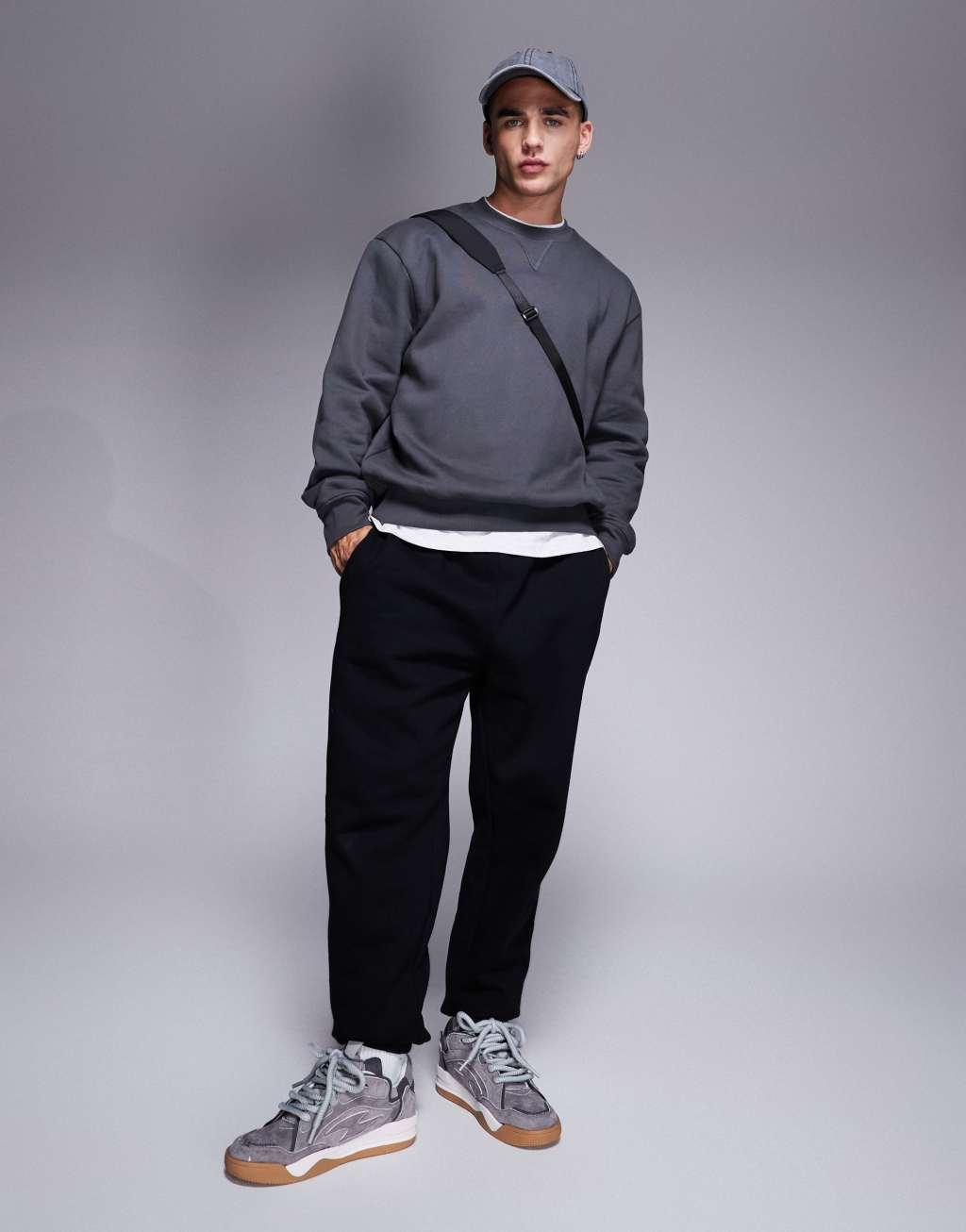 ASOS DESIGN premium heavyweight oversized sweatshirt in washed black Product Image