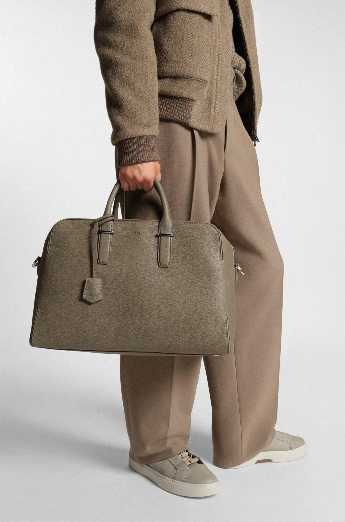 Grained-leather holdall with embossed logo Product Image