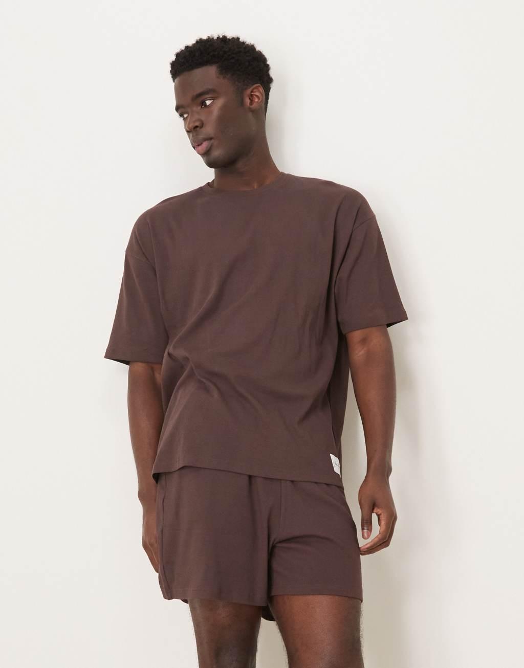 ASOS DESIGN ribbed T-shirt and shorts lounge set with embroidered patch in brown Product Image