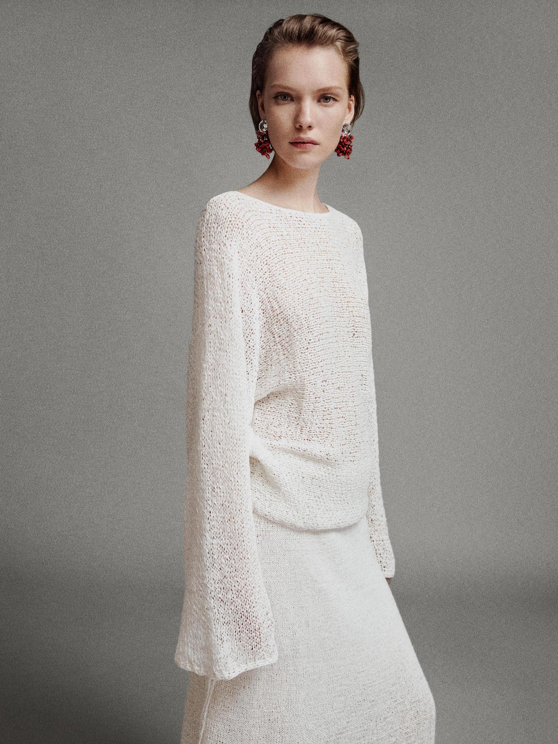 Balloon sleeve sweater with bows Product Image