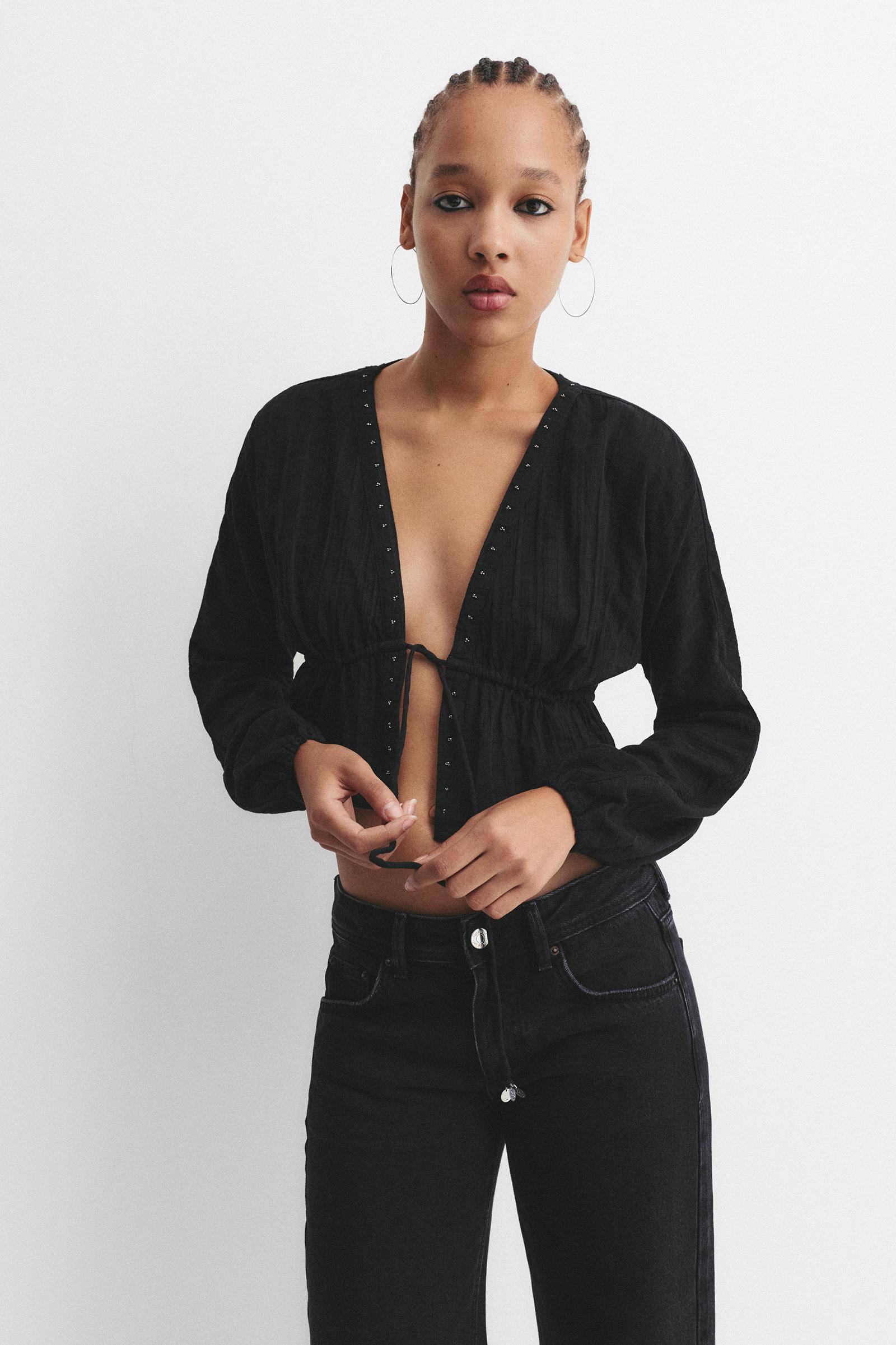 Beaded blouse with bow Product Image