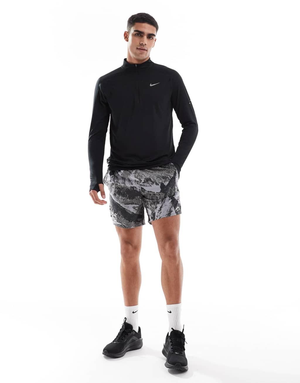 Nike Running Stride half zip sweatshirt in black Product Image