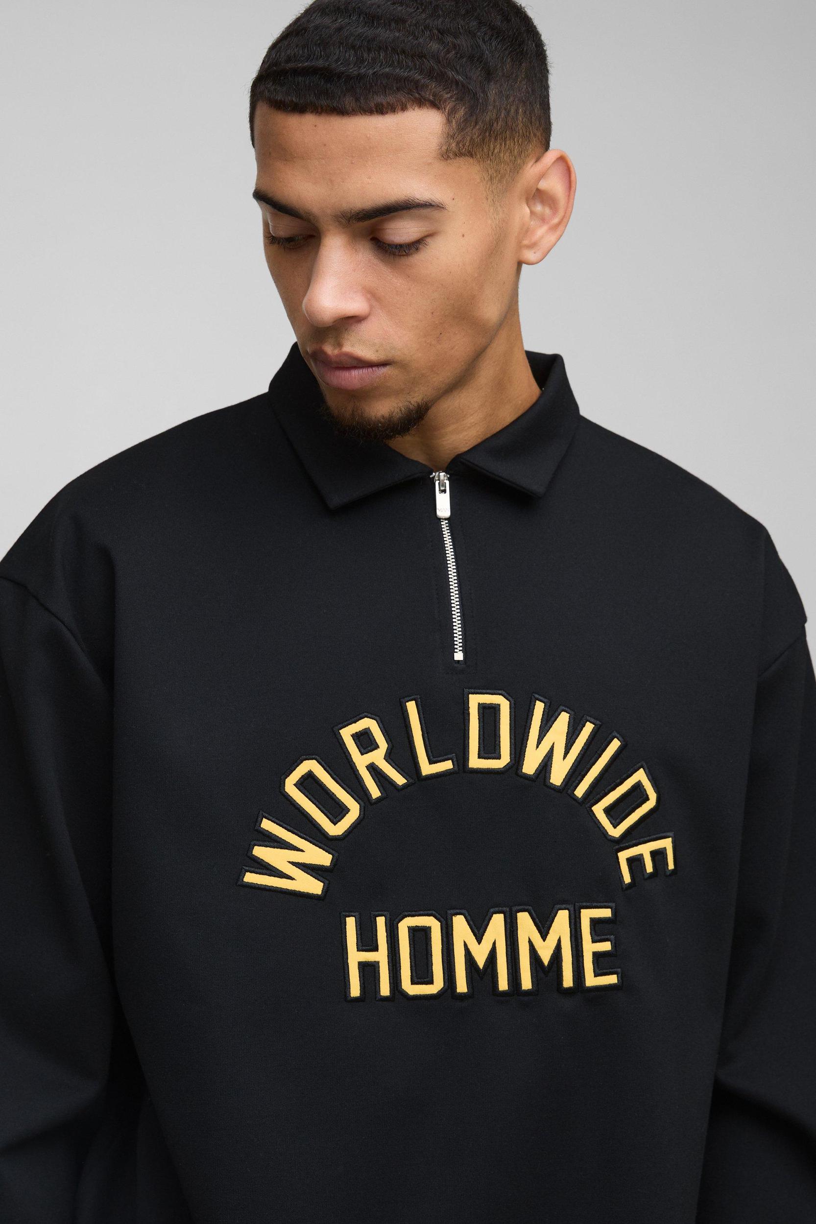Oversized Worldwide Applique Half Zip Rugby Polo | boohooMAN USA Product Image