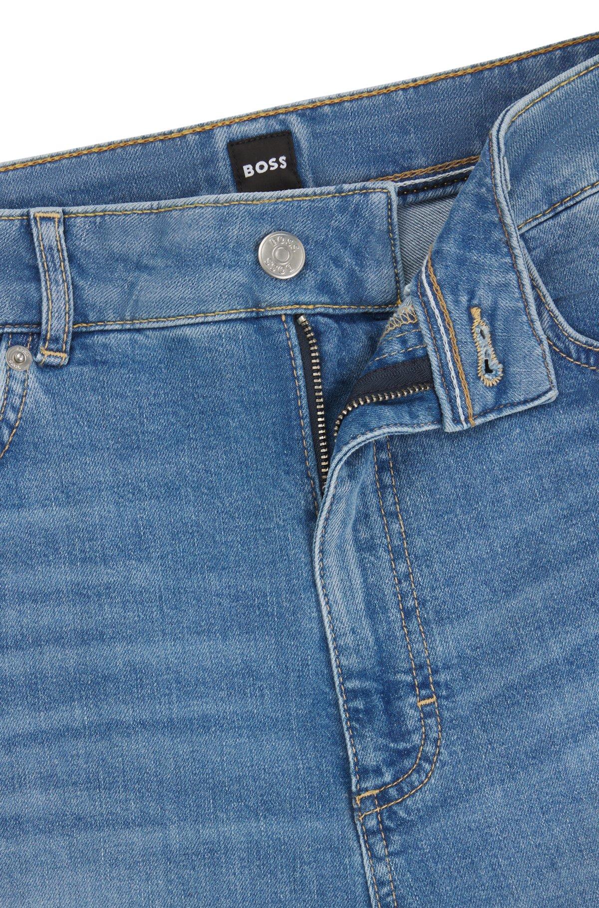 High-waisted cropped jeans in blue comfort-stretch denim Product Image