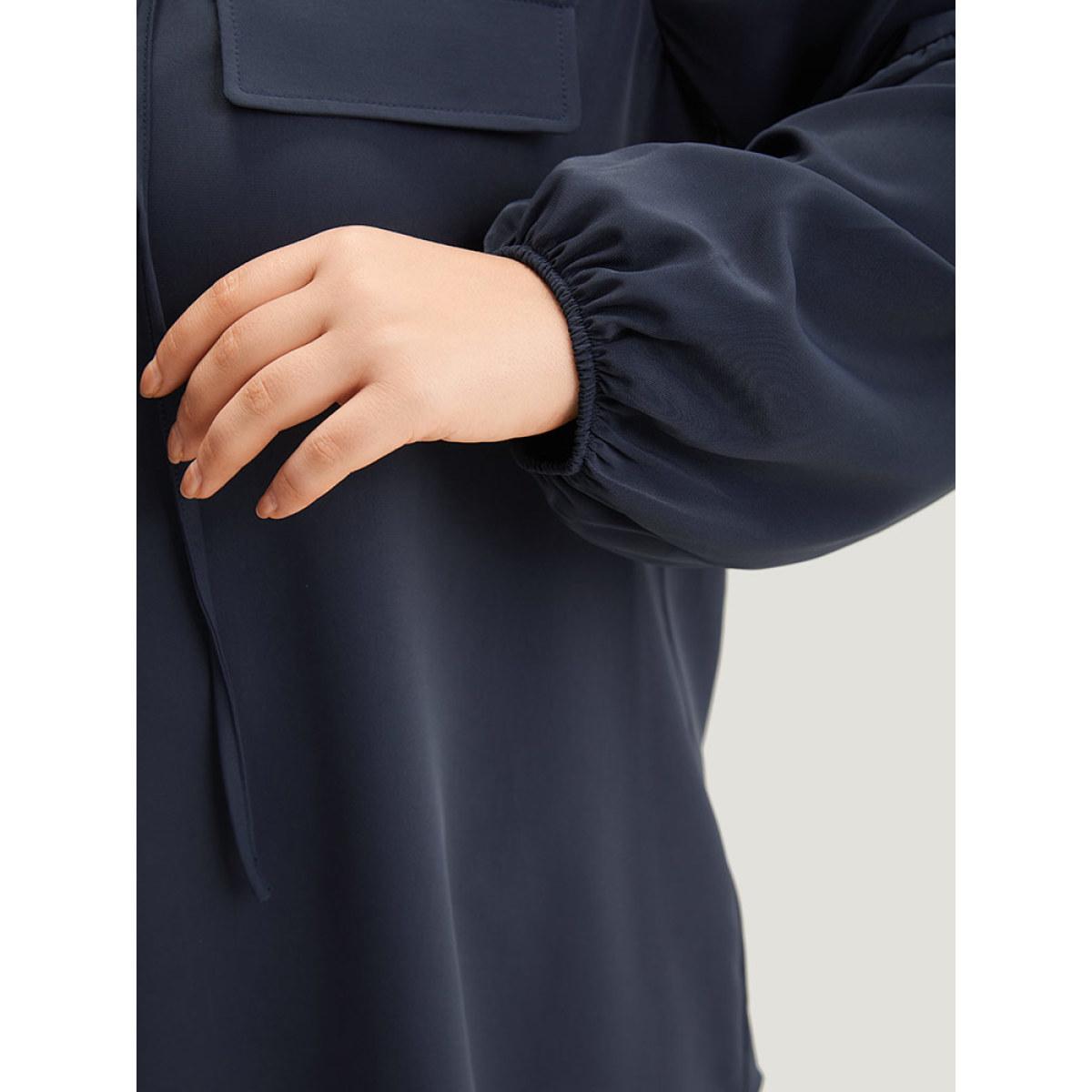 Plus Size Indigo Solid Elastic Cuffs Lace Up Blouse Women Office Long Sleeve V-neck Office Blouses BloomChic 10/M Product Image