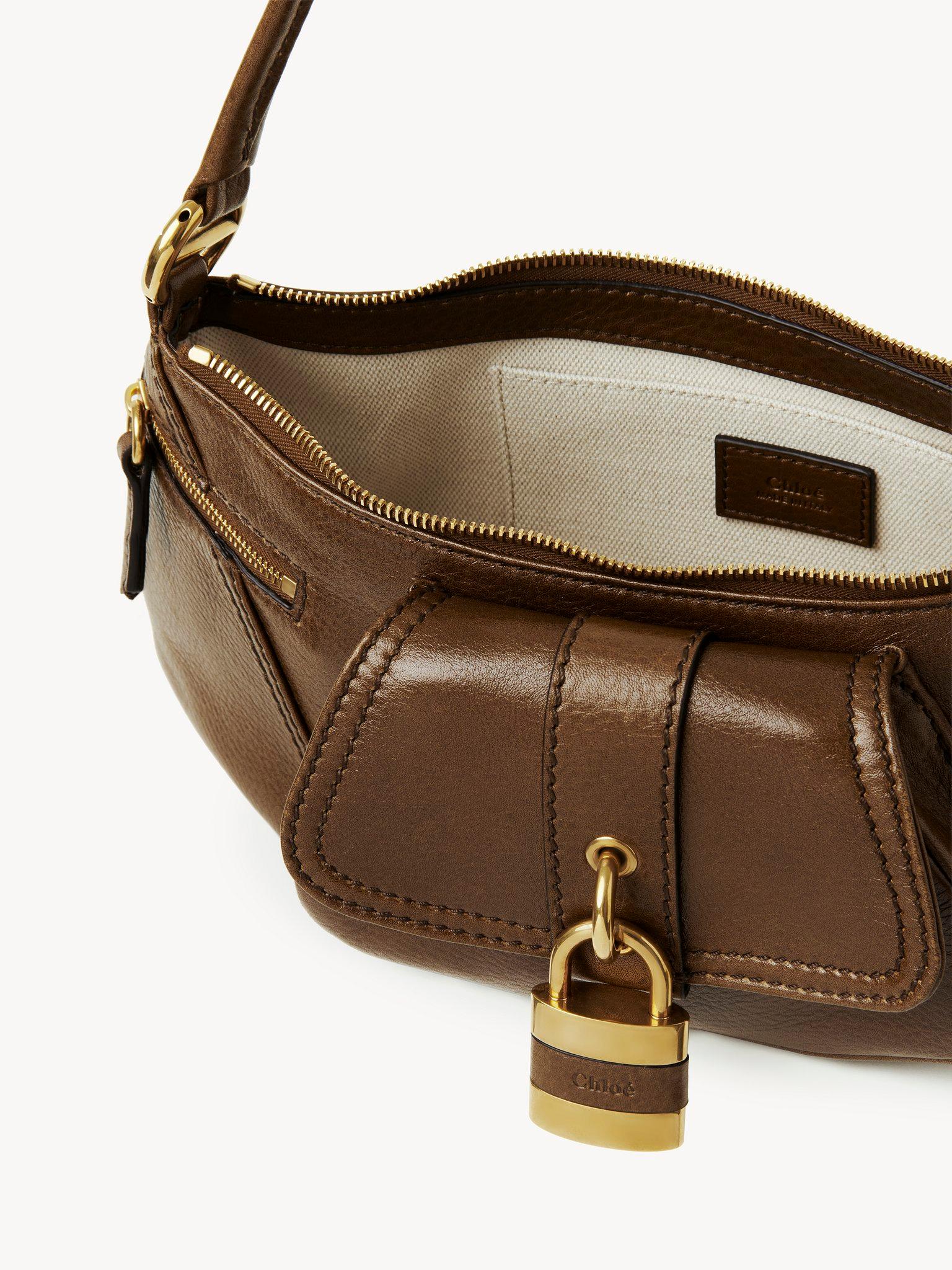 The 99 shoulder bag in grained leather Product Image