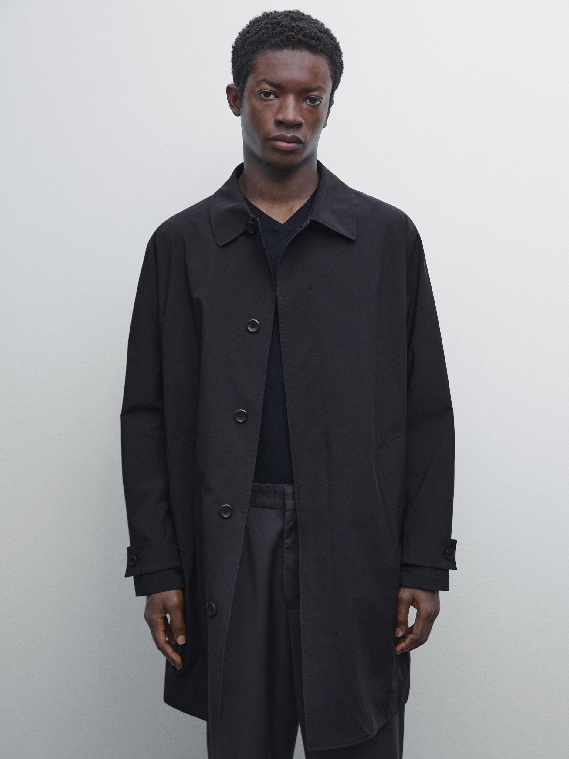 Lightweight trench coat with hidden buttons Product Image