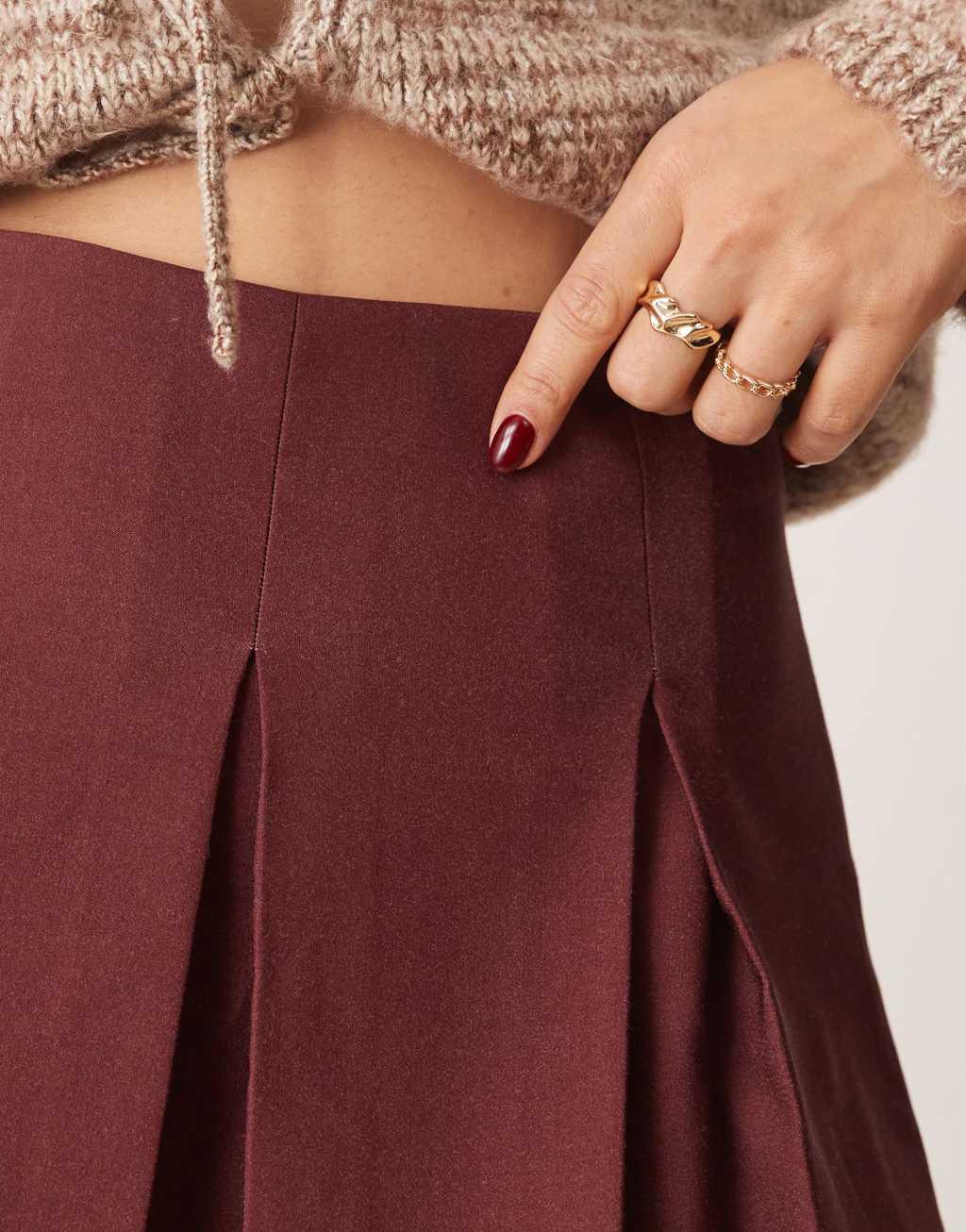 ASOS DESIGN pleated mini skirt in burgundy Product Image