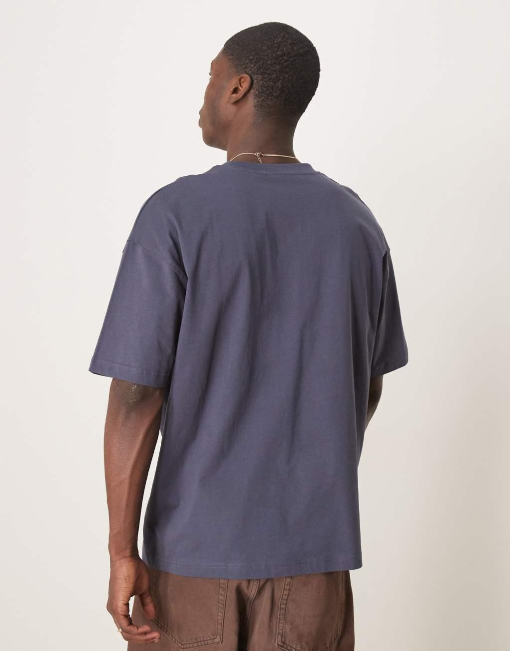 ASOS DESIGN oversized T-shirt with sports graphic in navy Product Image