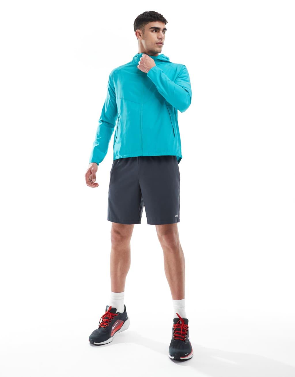 Nike Running Miler jacket in light blue Product Image