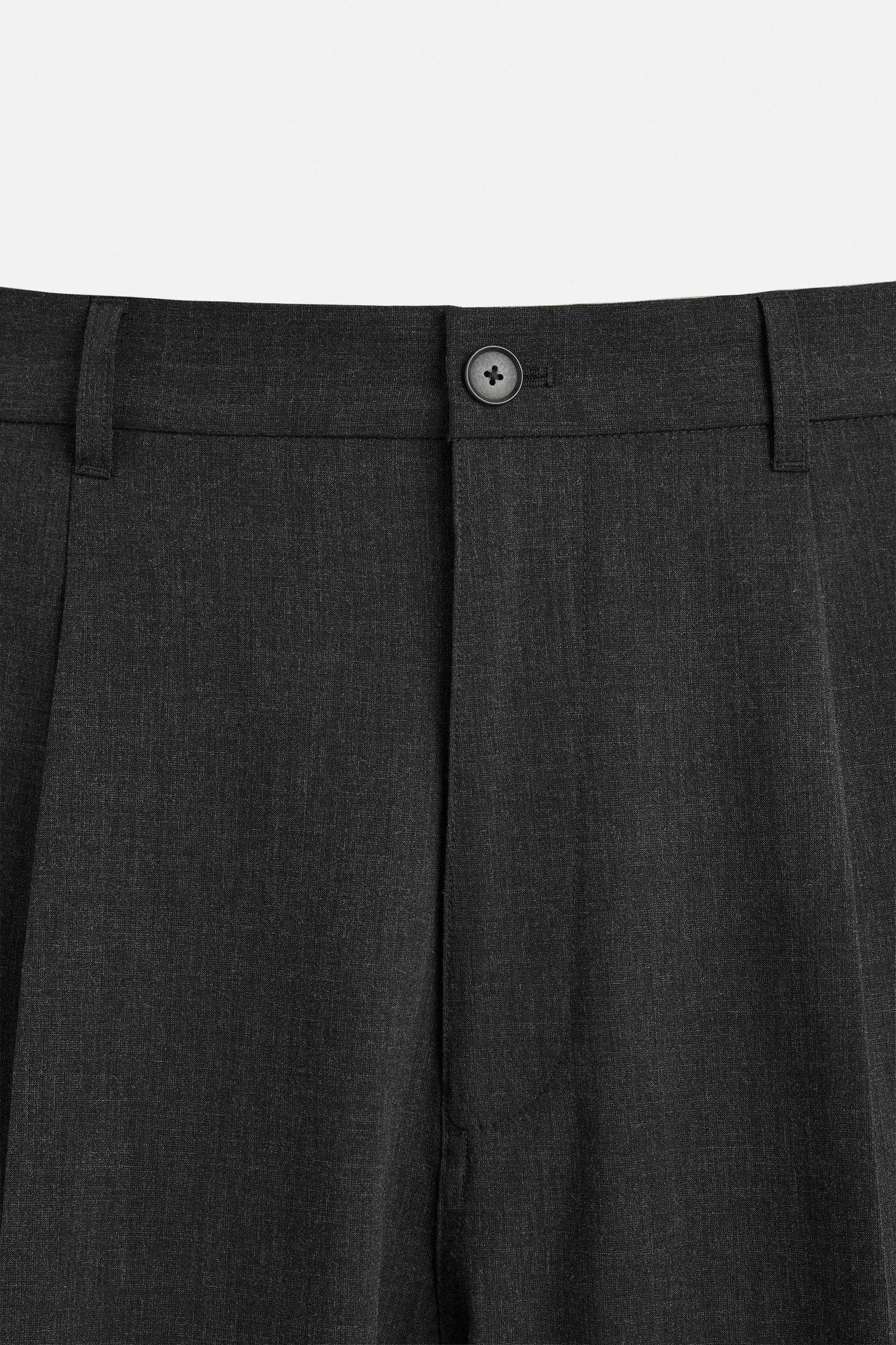 PLEATED SUIT PANTS Product Image