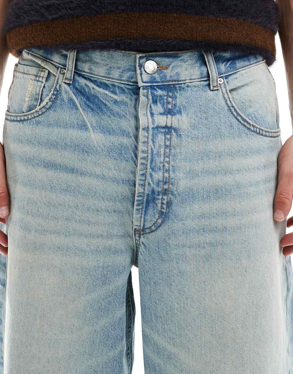 ASOS DESIGN baggy fit jeans in light wash blue Product Image