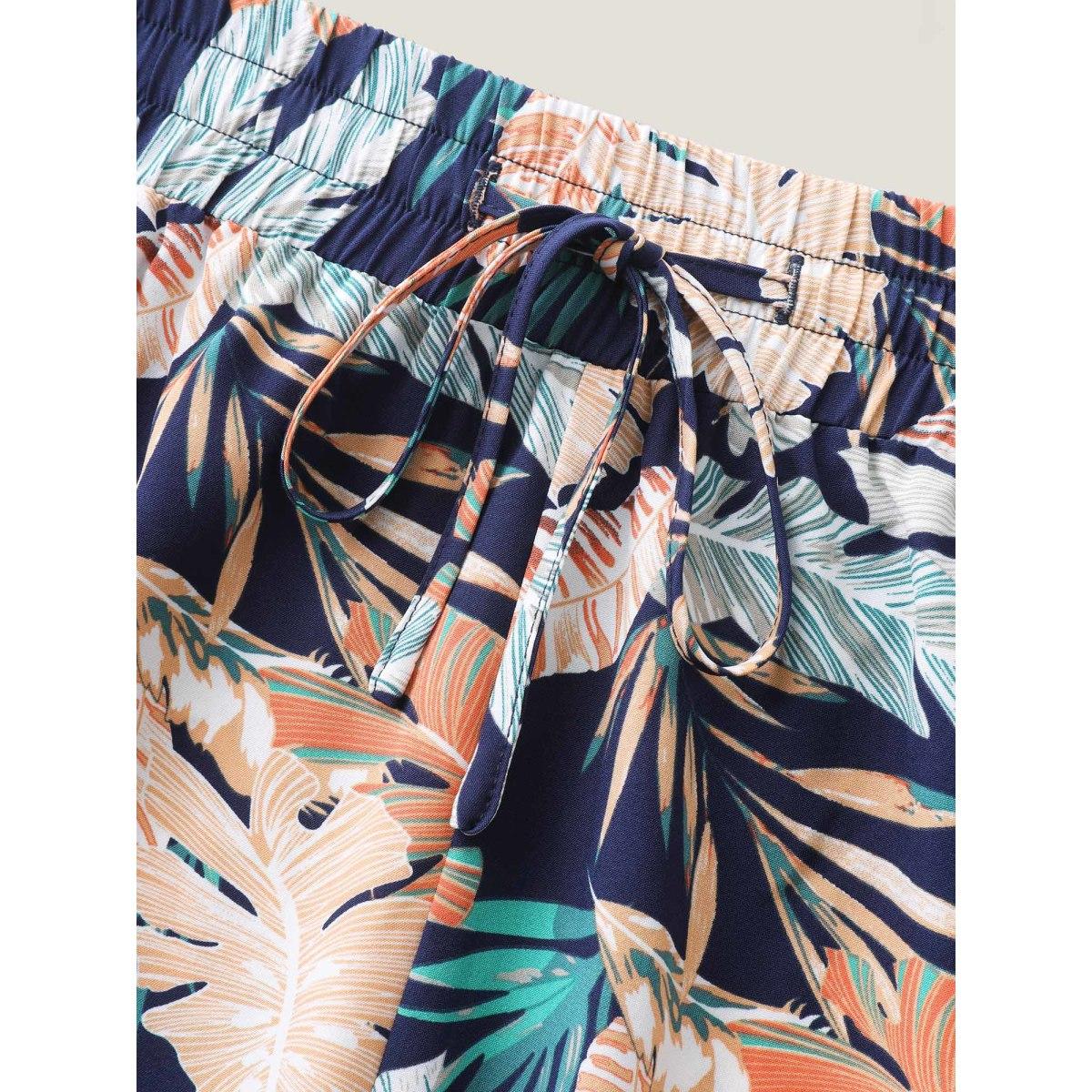 Plus Size Tropical Leaf Print Wide-Leg Pants Women Indigo Resort Wide Leg Mid Rise Vacation Pants BloomChic 22-24/3X Product Image