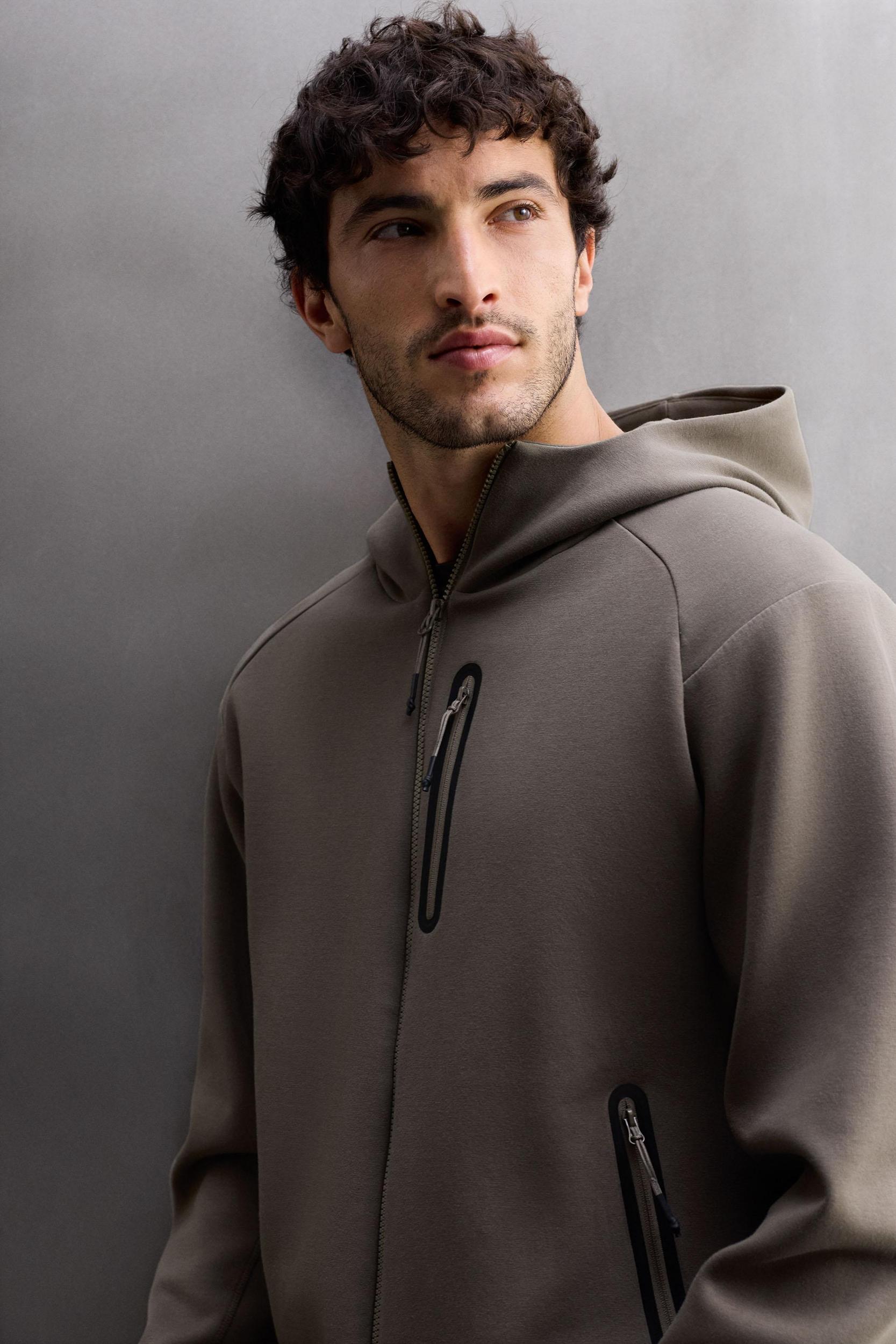 TECHNICAL ZIP-UP HOODIE Product Image