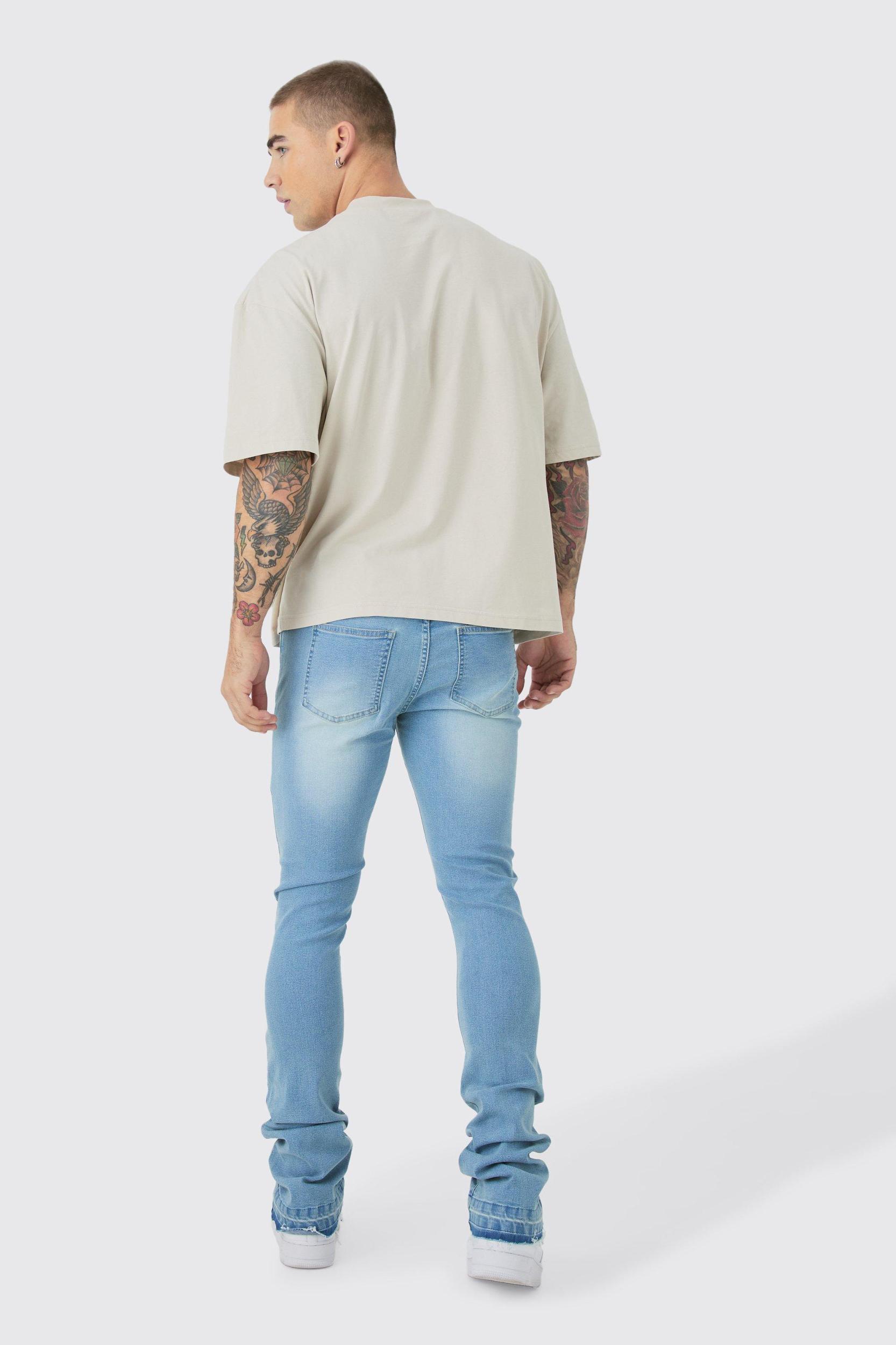Skinny Stacked Flared Jeans With Knee Rip | boohooMAN USA Product Image