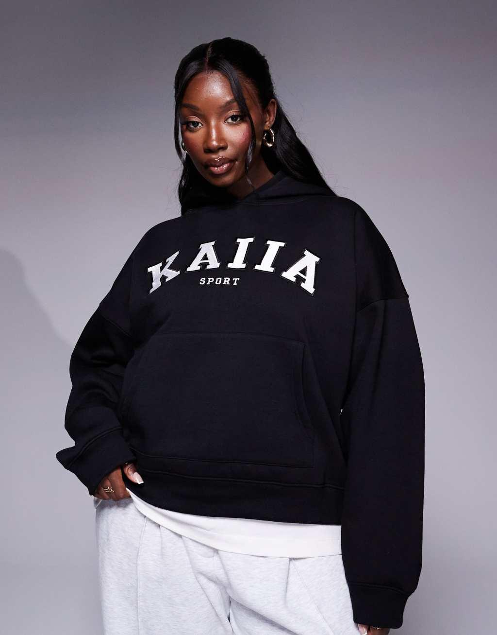 Kaiia Plus logo oversized hoodie in black Product Image