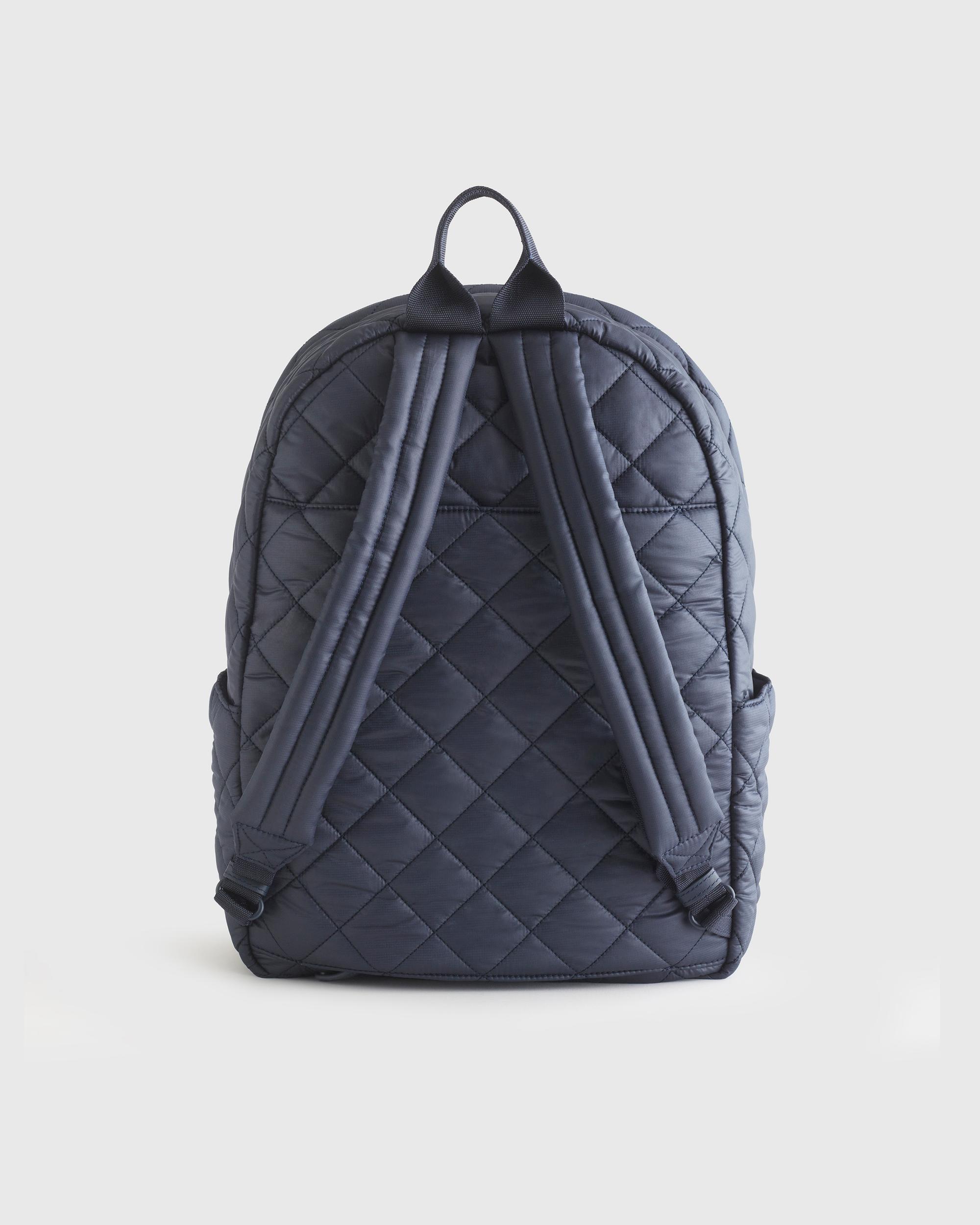 Quince | Women's Transit Quilted Commuter Backpack in Navy, Nylon Product Image