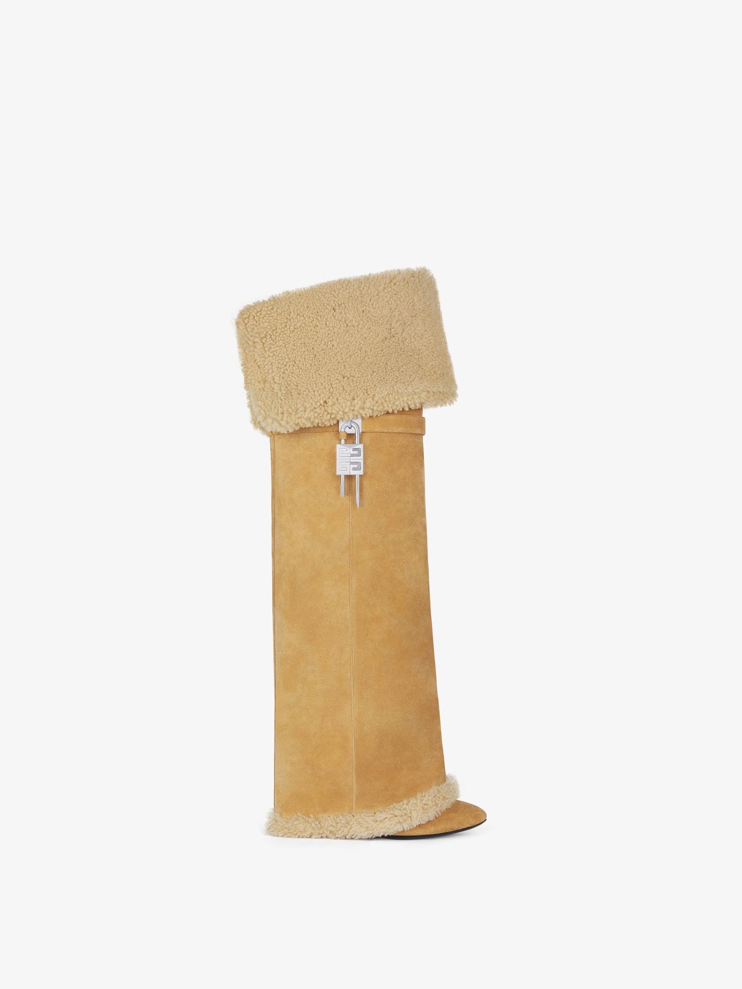 Shark Lock Stiletto boots in suede and shearling Product Image