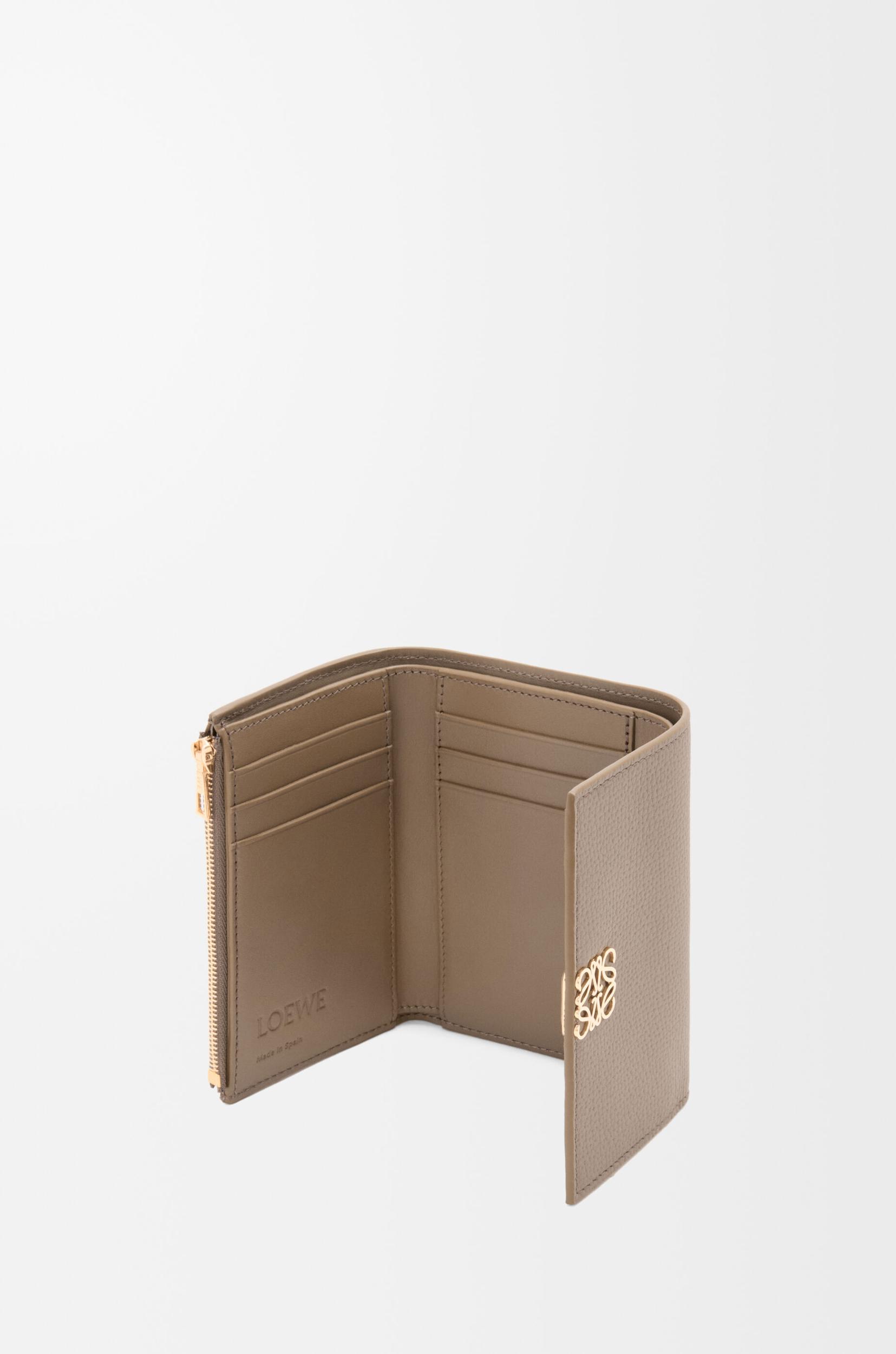 Anagram small vertical wallet in pebble grained calfskin Product Image