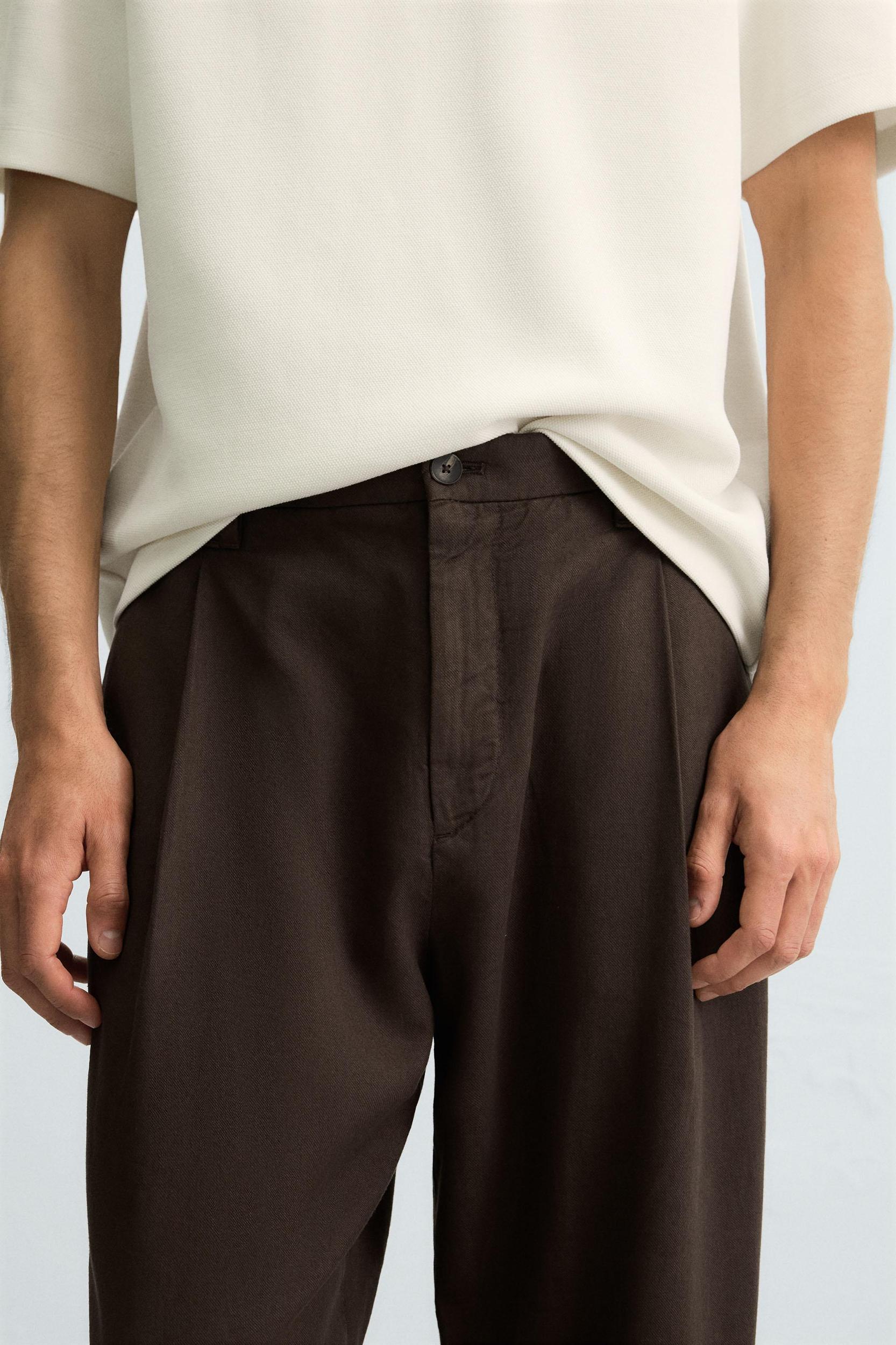 FLOWY PLEATED PANTS Product Image