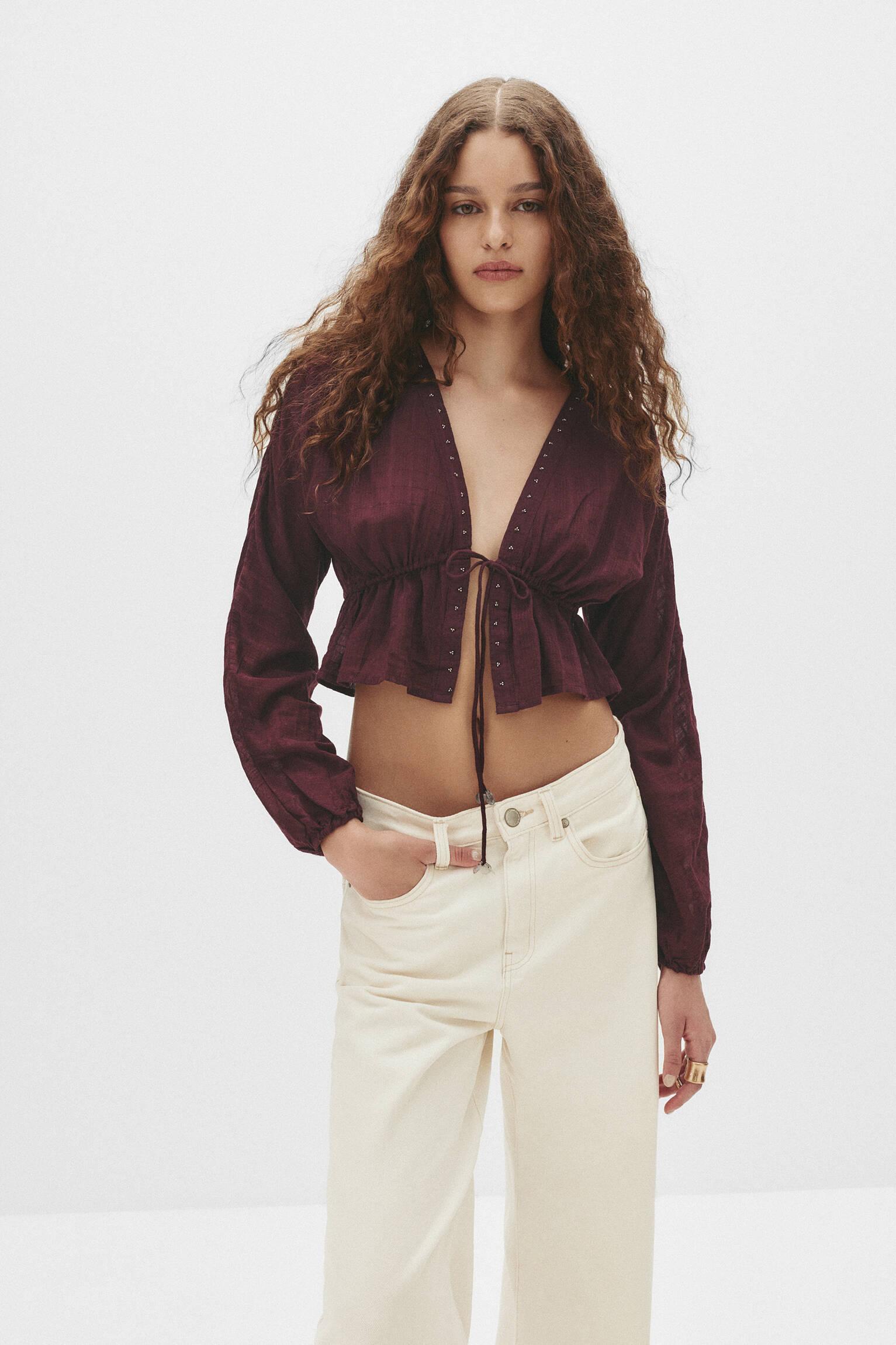 Beaded blouse with bow Product Image