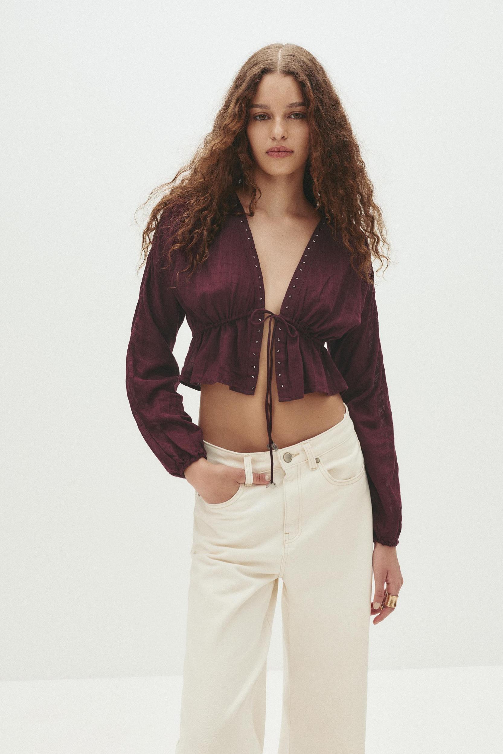 Beaded blouse with bow Product Image