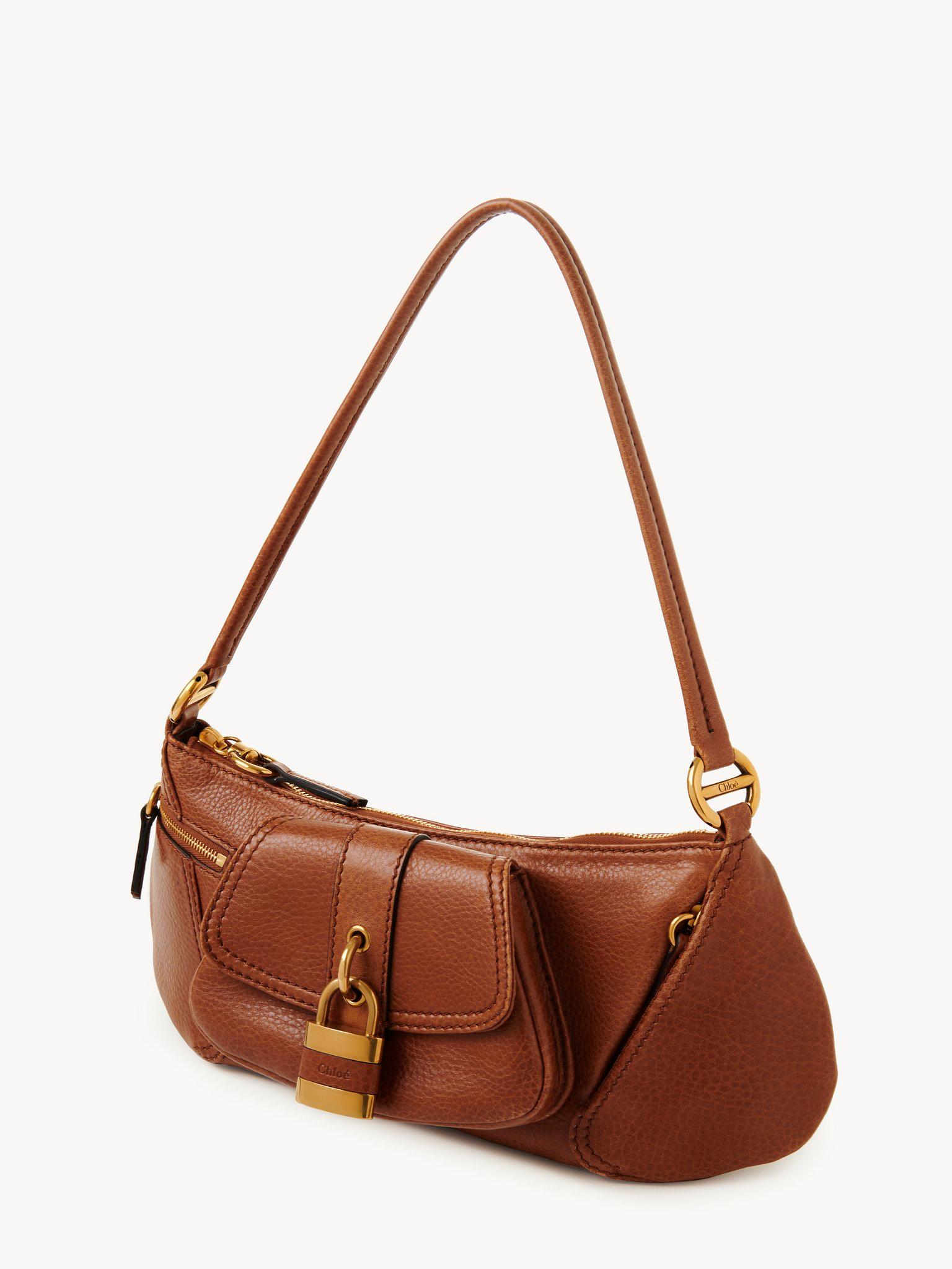The 99 shoulder bag in grained leather Product Image