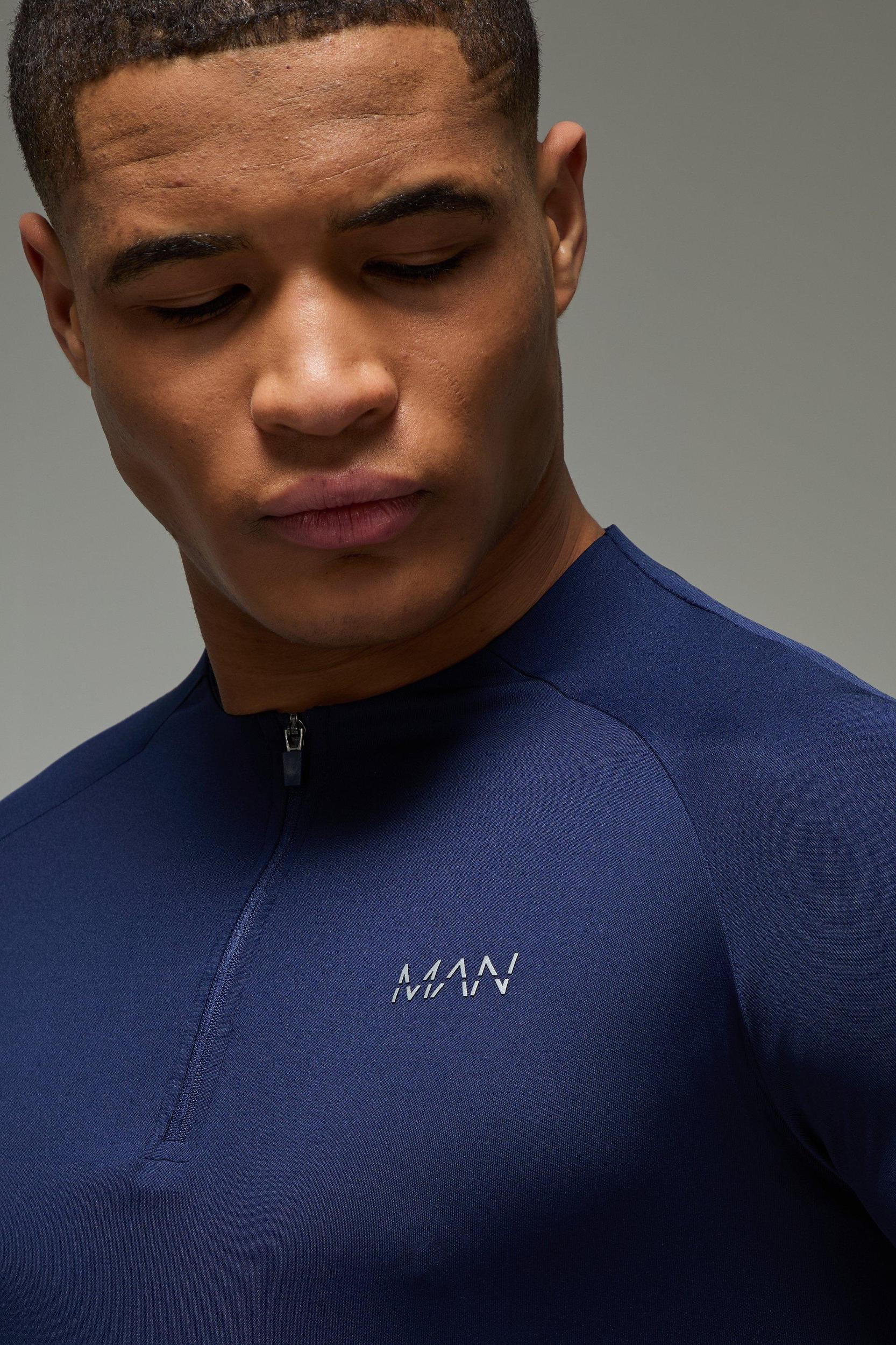 Man Active Muscle Fit Crew Neck 1/4 Zip | boohooMAN USA Product Image