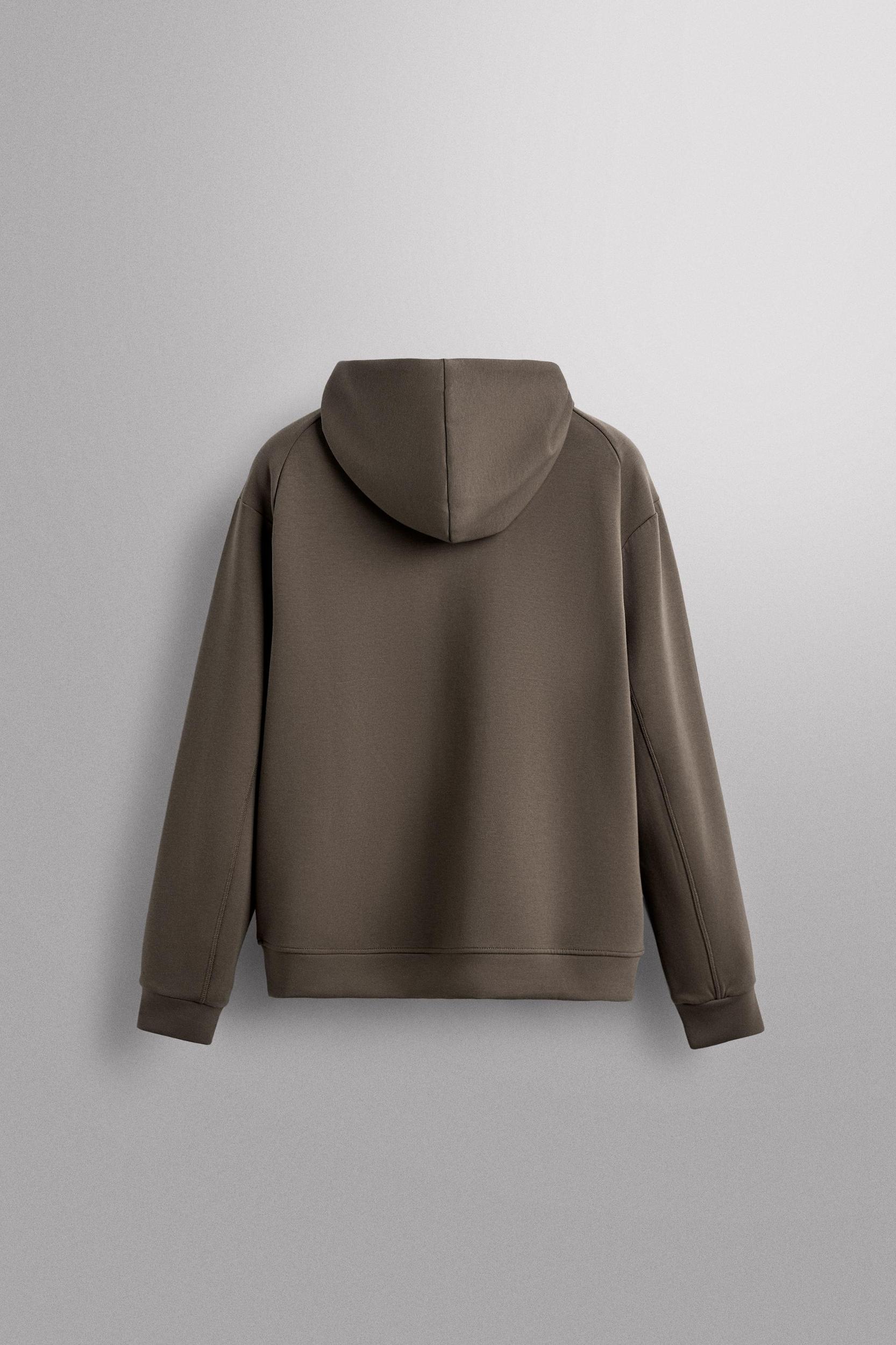 TECHNICAL ZIP-UP HOODIE Product Image