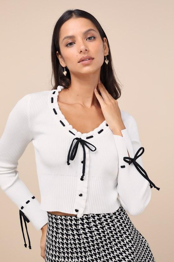 Adorably Flattering Ivory Ribbed Ruffled Bow Sweater Top Product Image