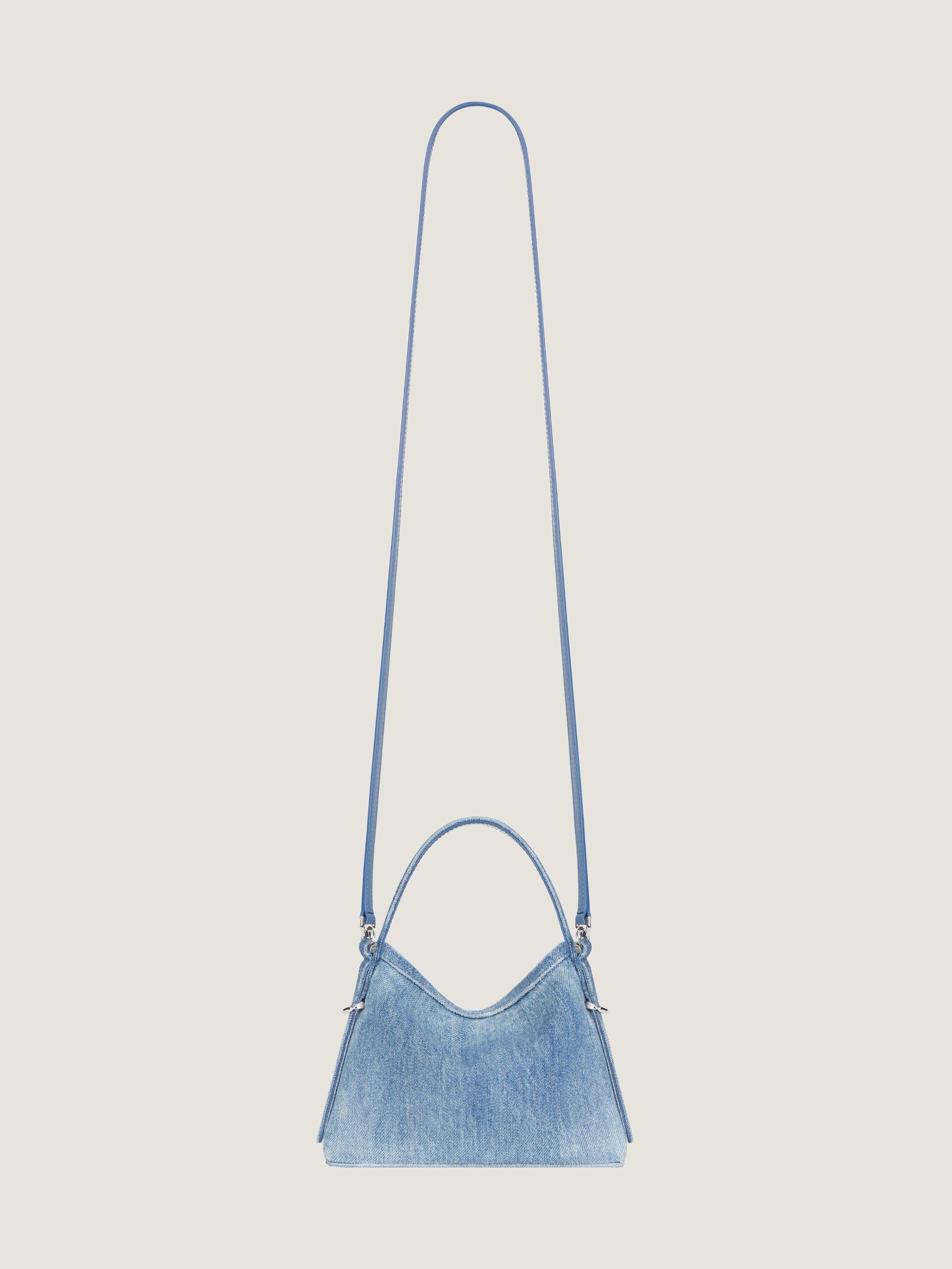 Nano Voyou bag in washed denim Product Image