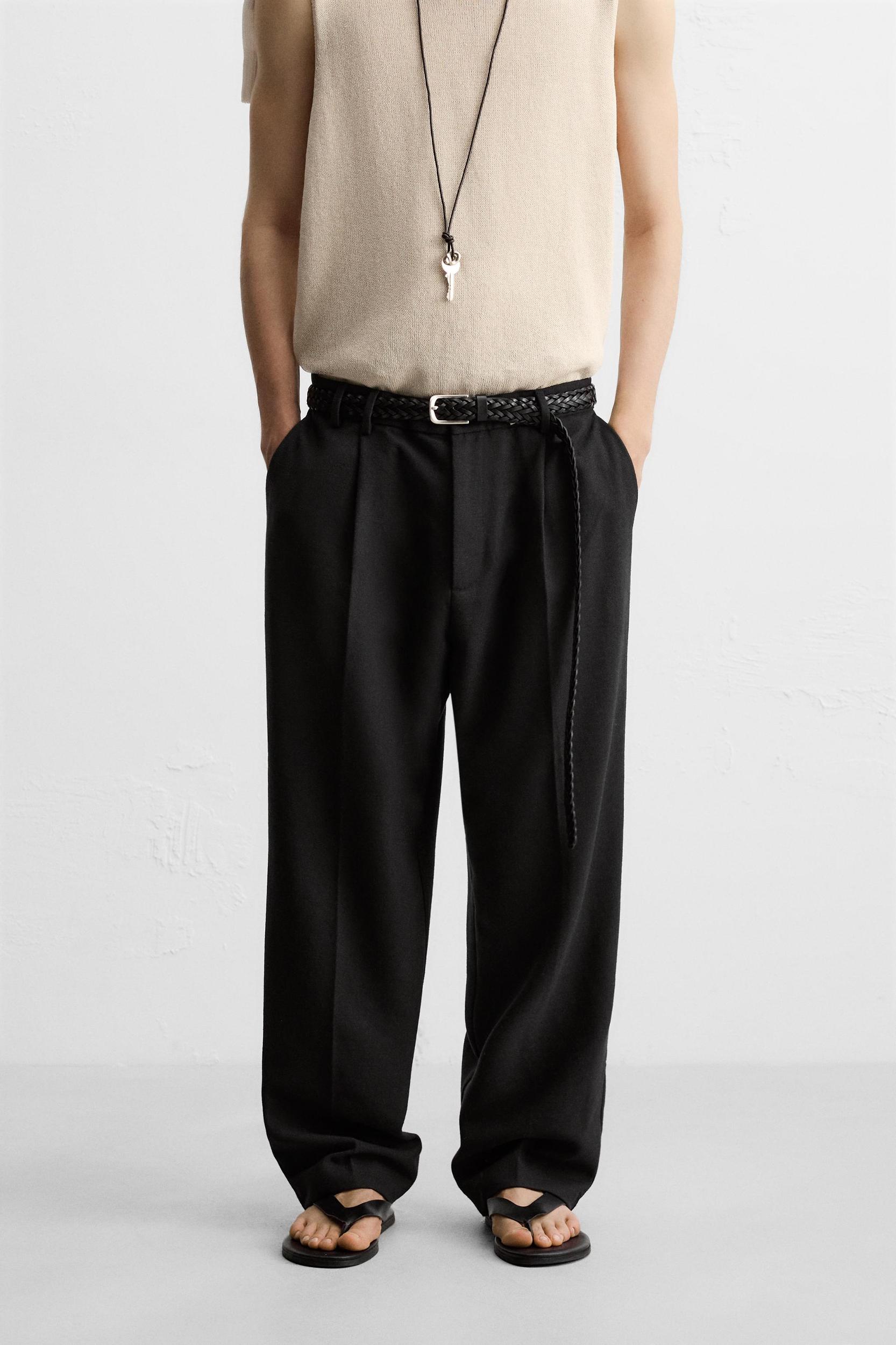 PLEATED RELAXED FIT PANTS Product Image
