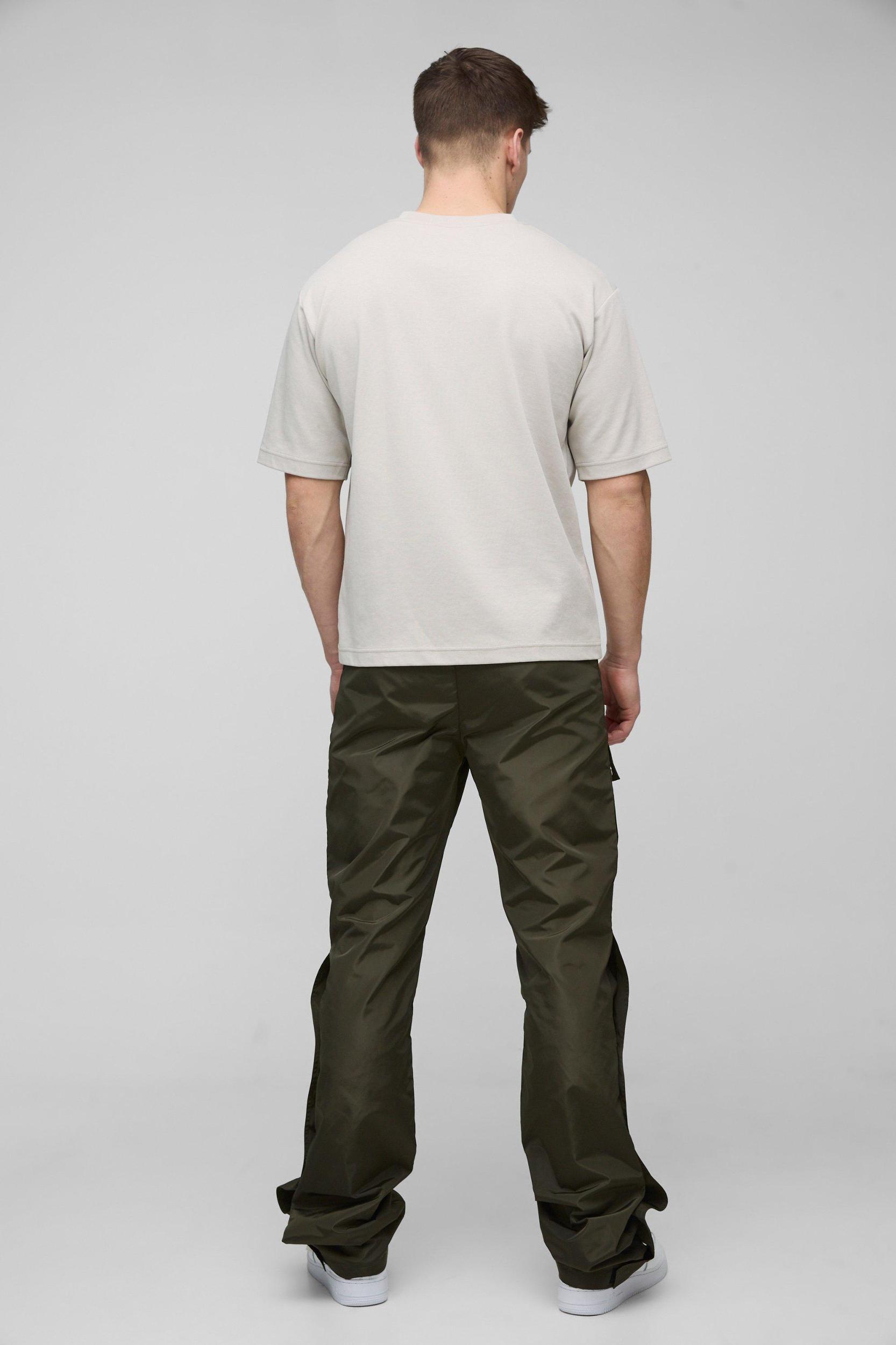 Tall Elasticated Waist Slim Flare Stacked Cargo Pants | boohooMAN USA Product Image