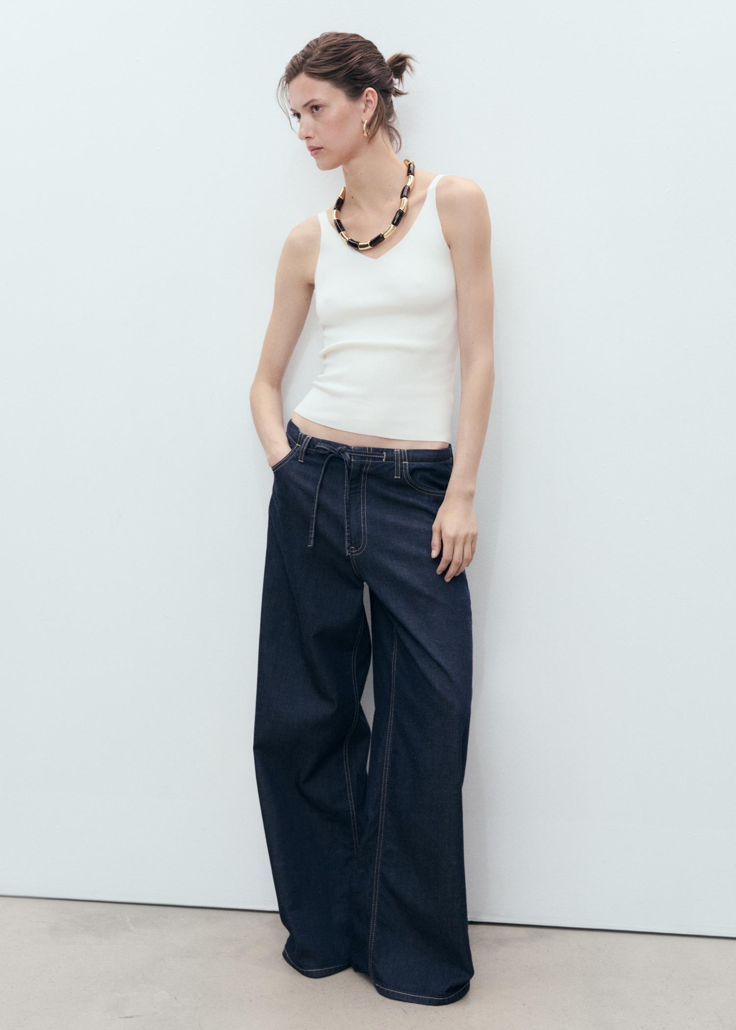 V-neck knitted top - Women | MANGO USA Product Image