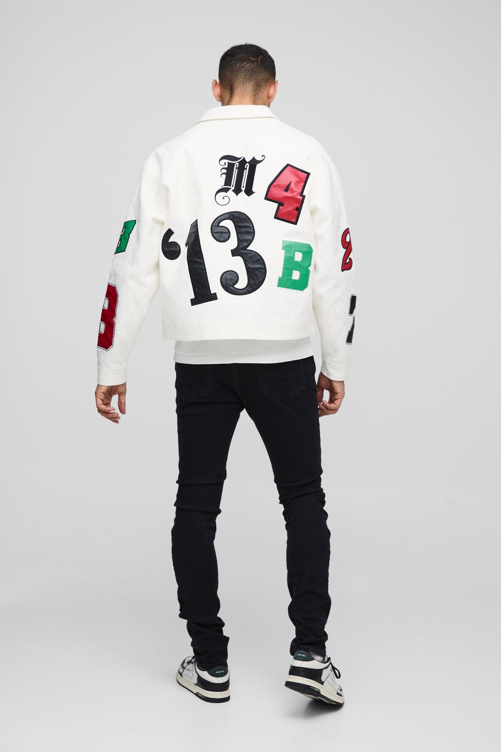 Skinny Stacked Cross Applique Jeans | boohooMAN USA Product Image