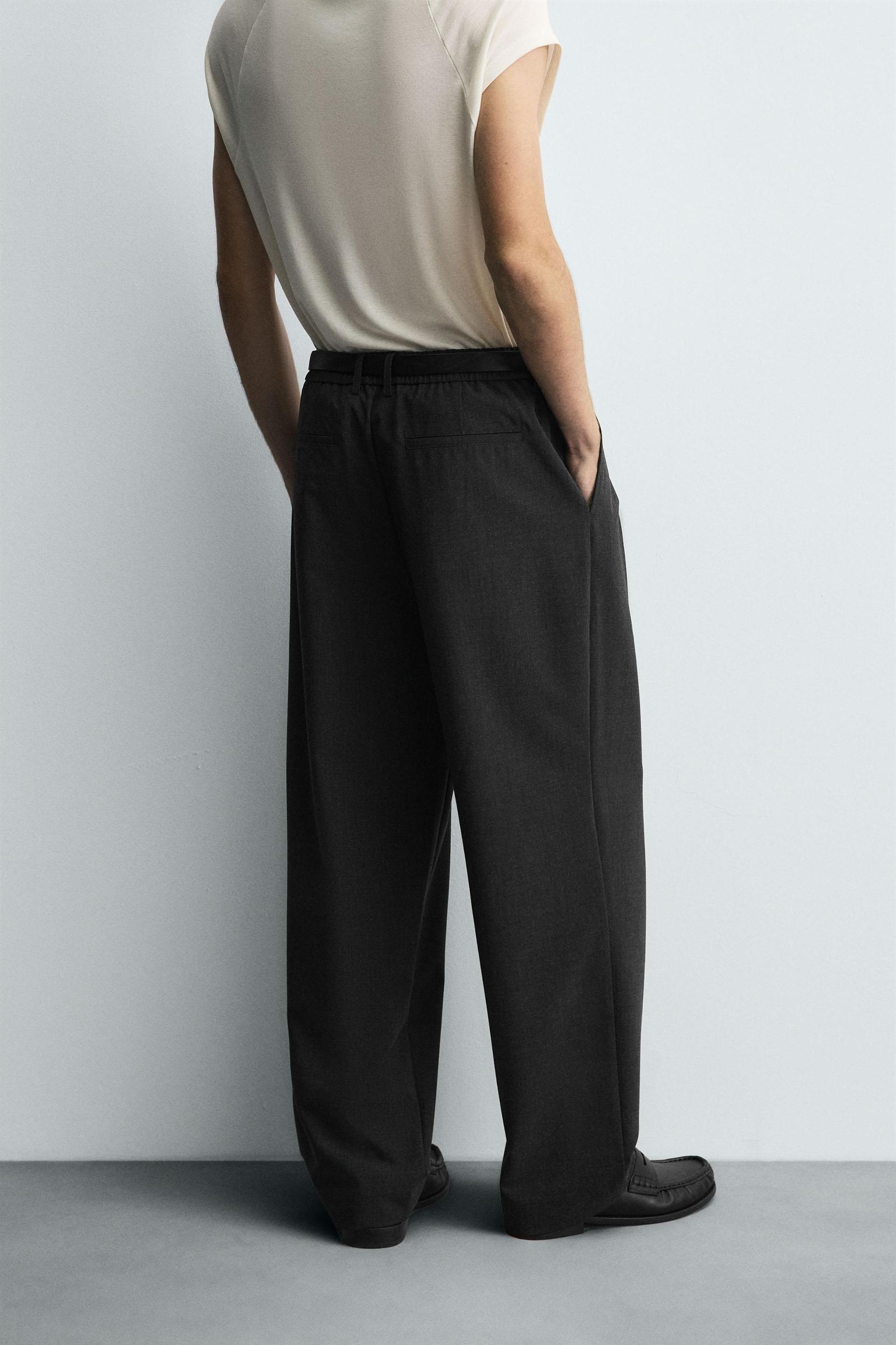 PLEATED WIDE FIT PANTS Product Image