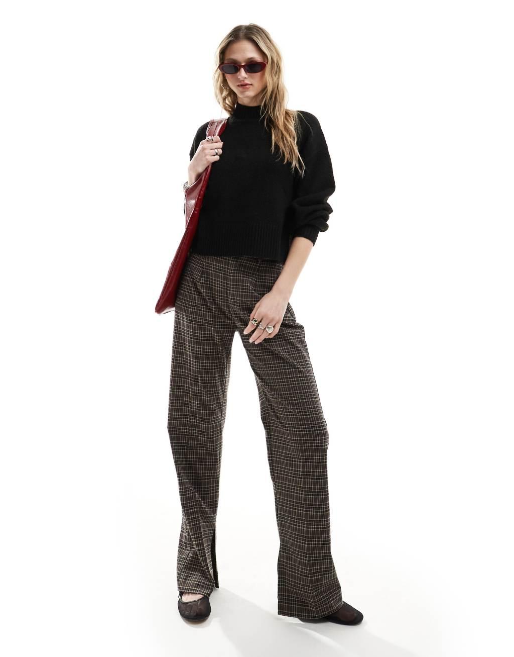 Monki knitted turtleneck sweater in black Product Image