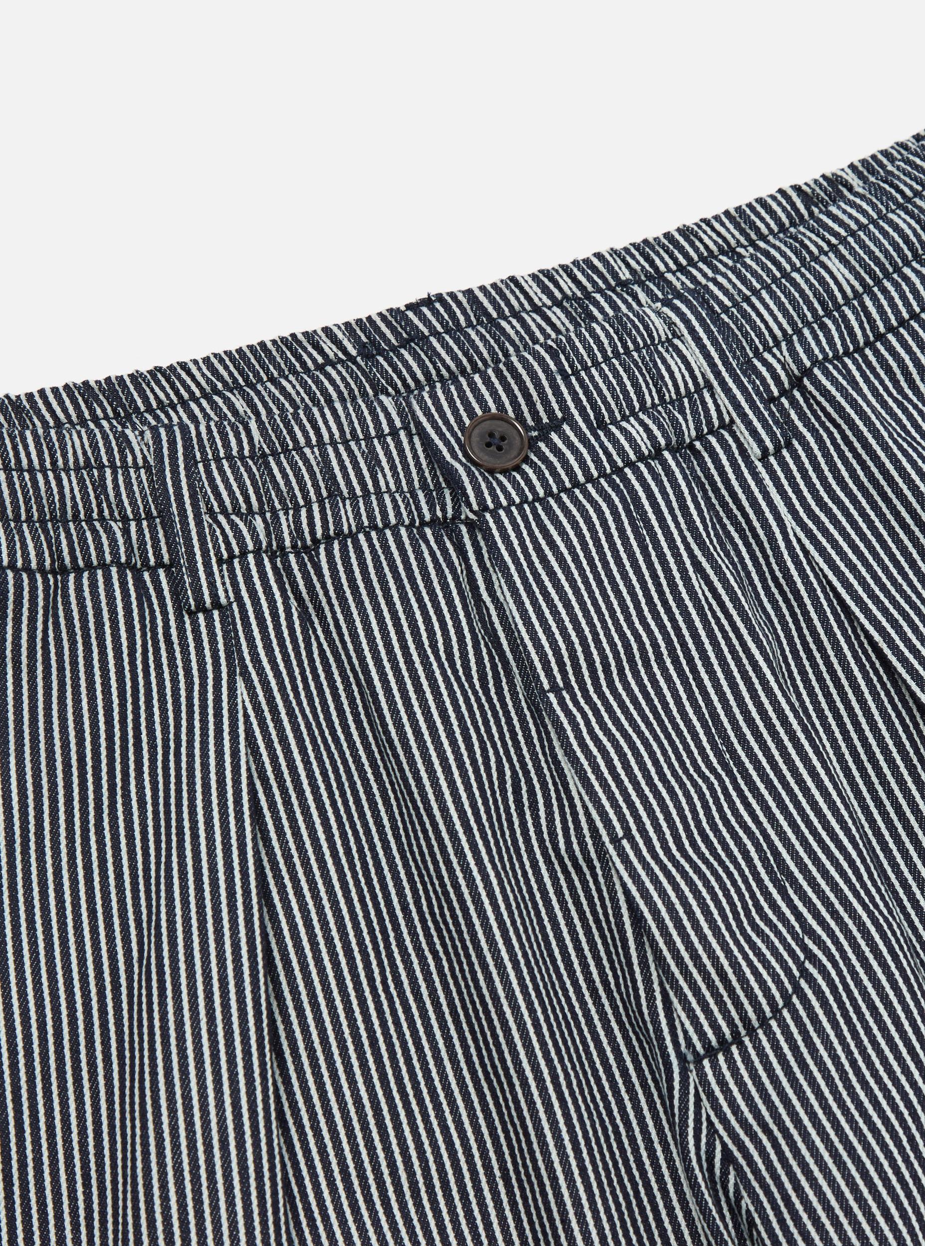 Universal Works Pleated Track Pant in Indigo Hickory Stripe Denim Product Image