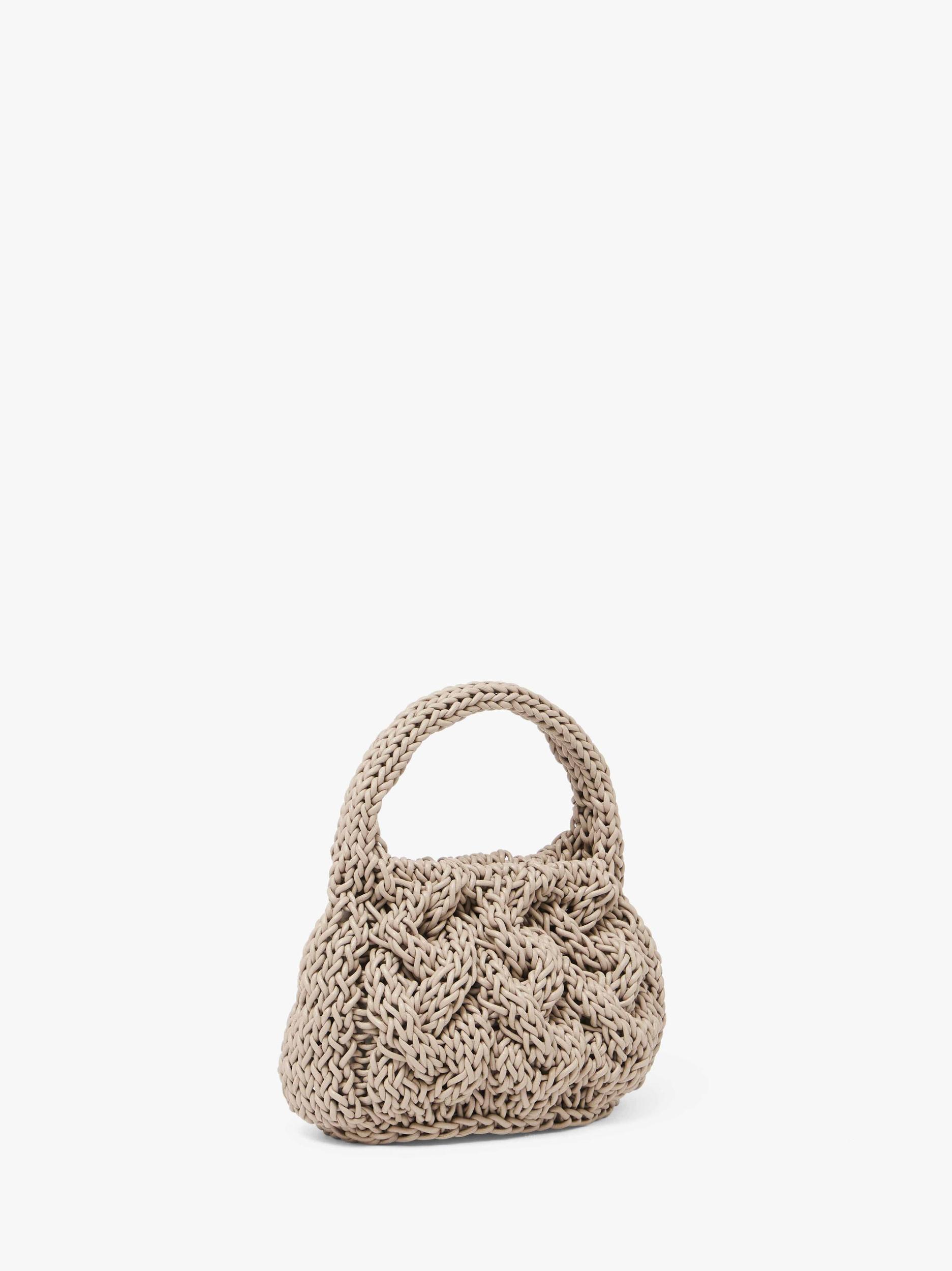 SMALL CABLE KNIT BAG - LEATHER DRAWCORD TOP HANDLE BAG Product Image