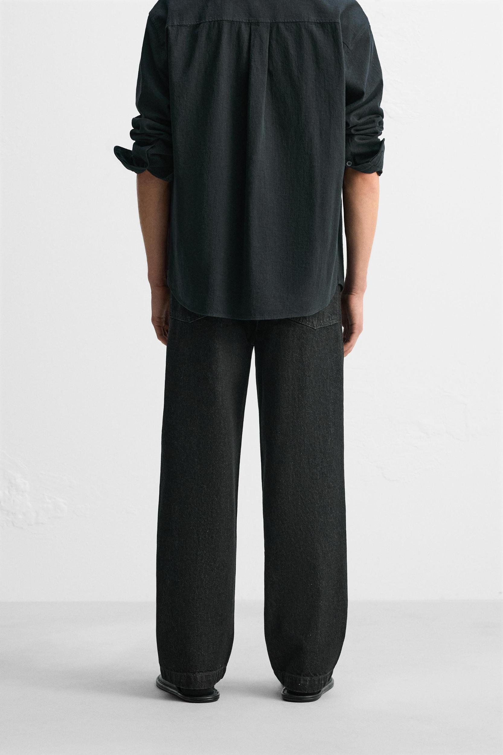 RELAXED FIT FRAYED SEAM JEANS Product Image