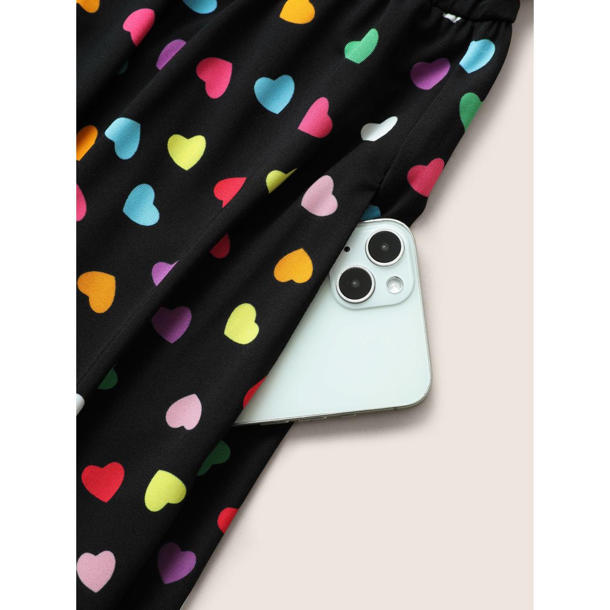 Plus Size Colored Heart Print Belted Overlap Collar Dress Black Women Casual Belted Overlap Collar Elbow-length sleeve Curvy Midi Dress BloomChic 30/6X Product Image