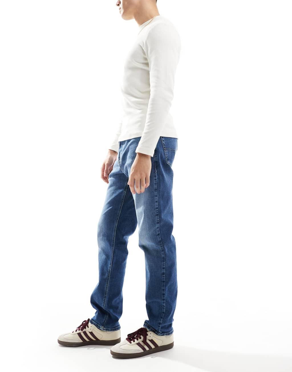 Tommy Jeans Ryan regular straight jeans in mid wash Product Image