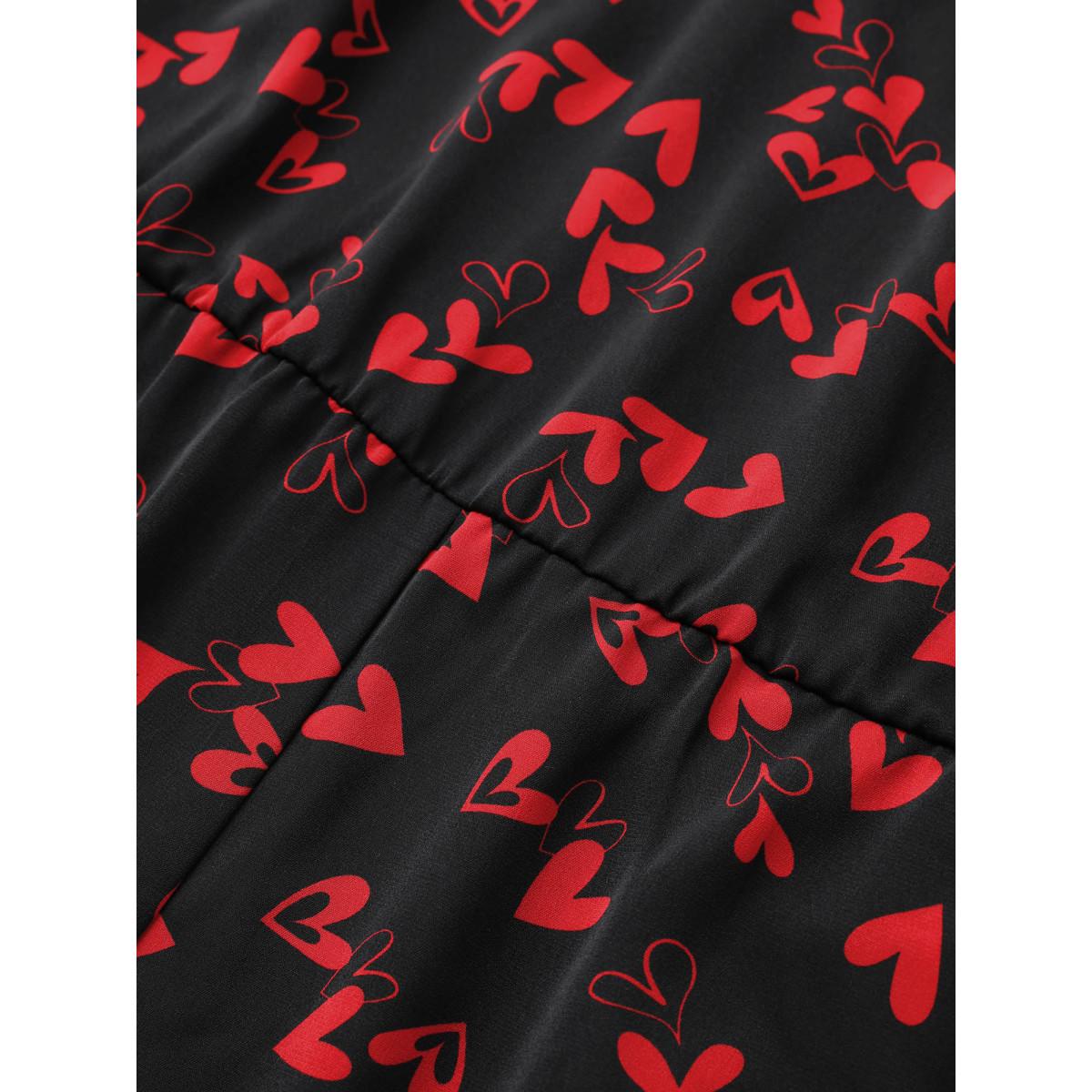 Plus Size Black Heart Print Pocket Belted Jumpsuit Women Elegant Short sleeve V-neck Everyday Loose Jumpsuits BloomChic 22-24/3X Product Image